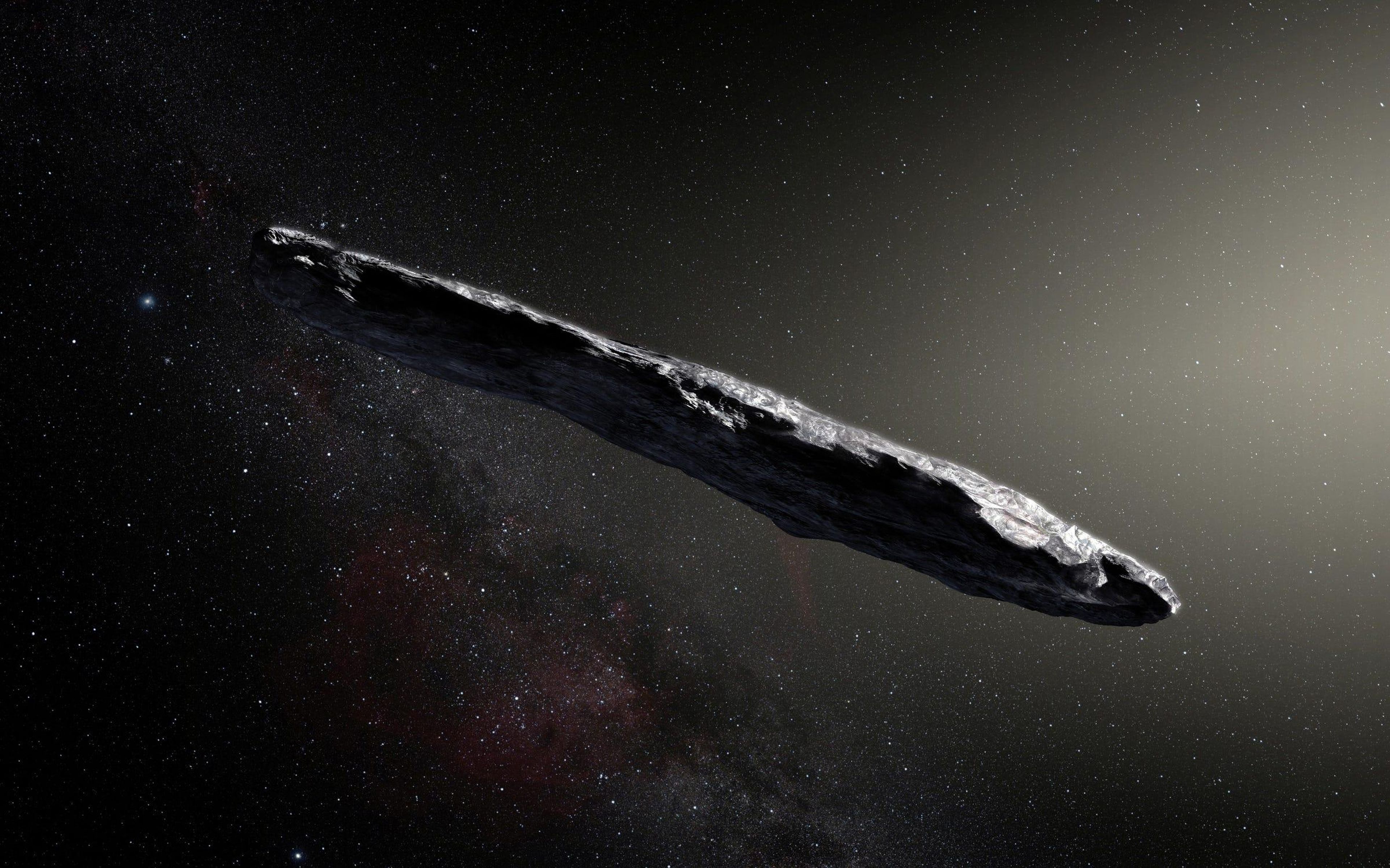La impresión de este artista muestra el primer objeto interestelar conocido que visitó el sistema solar, "Oumuamua", que fue descubierto el 19 de octubre de 2017 por el telescopio Pan-STARRS1 en Hawai.