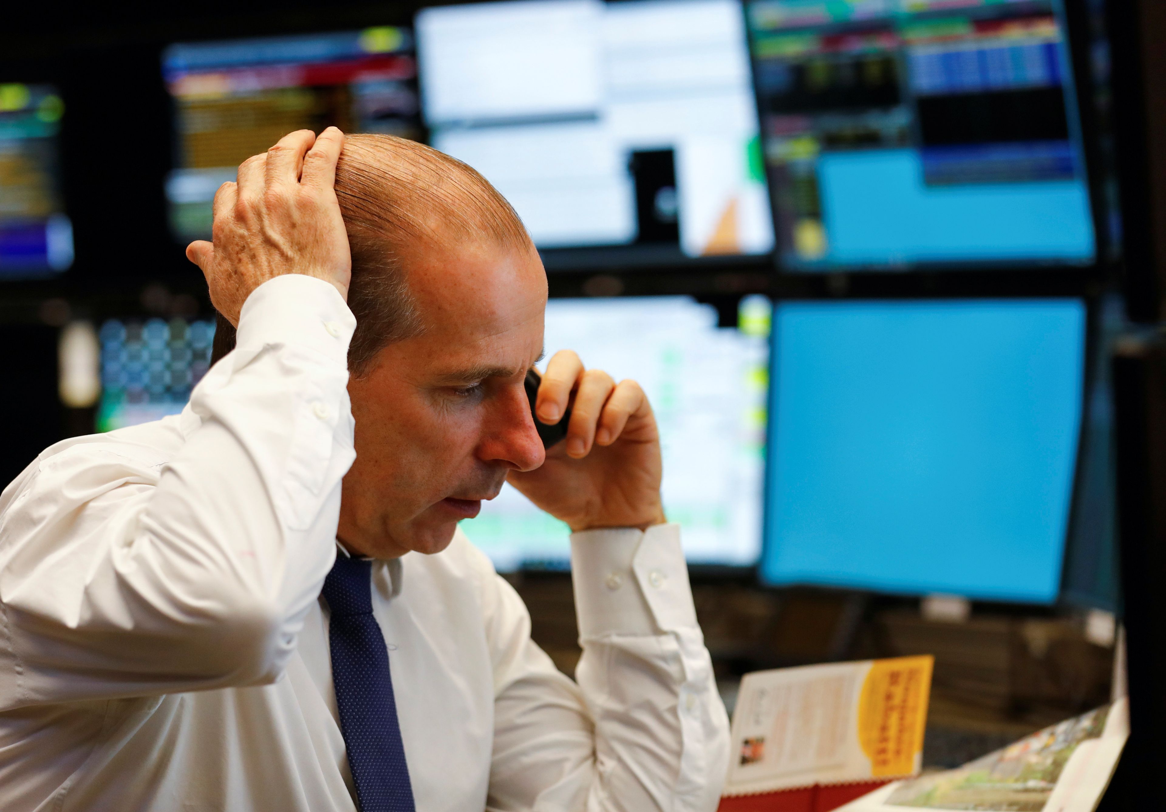 Trader de Wall Street sorprendido con una operación.