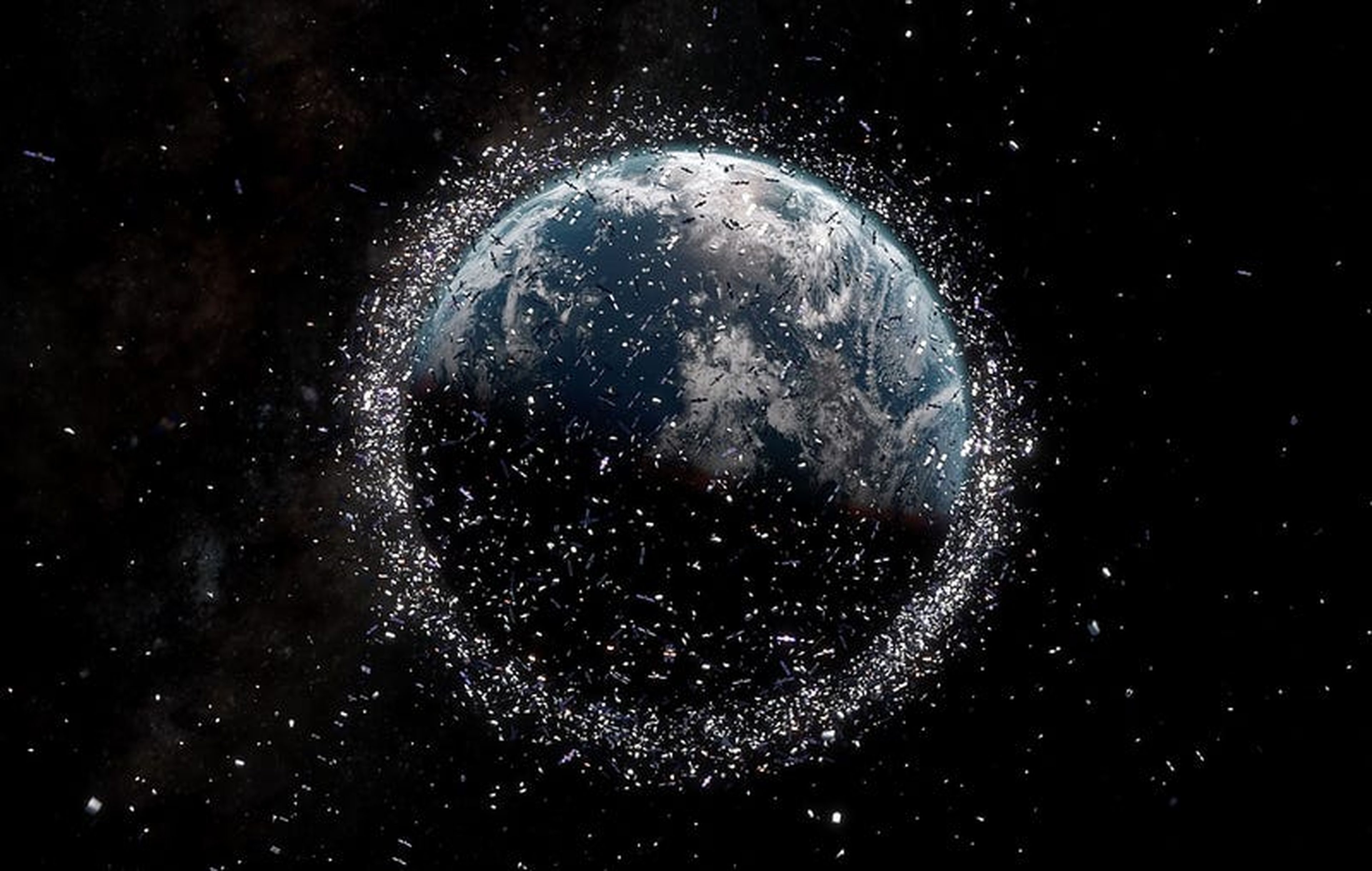 Ilustración de la basura espacial (los satélites y los escombros no están a escala).