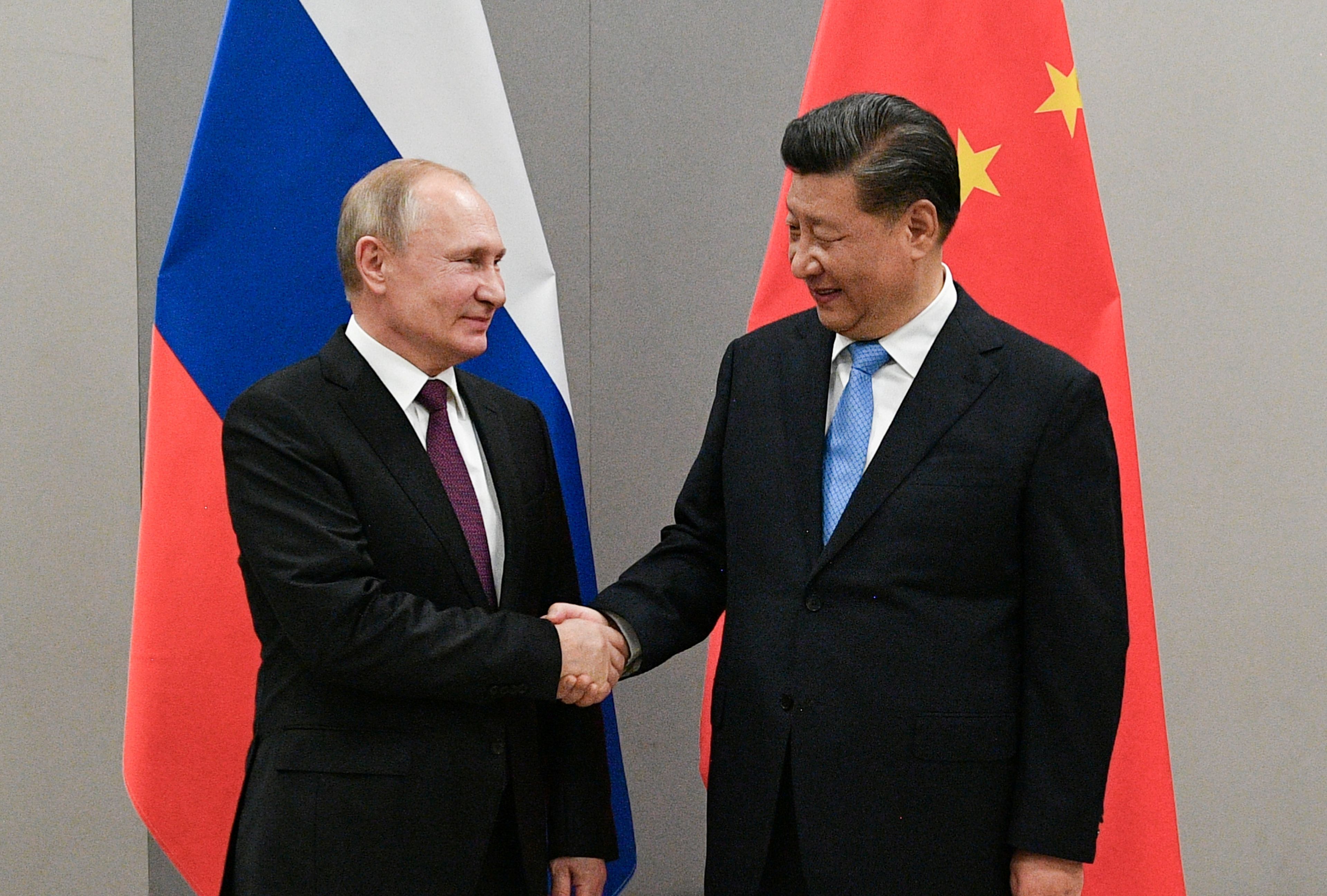 Vladimir Putin, presidente de Rusia, junto a Xi Jinping, presidente de la República Popular China.