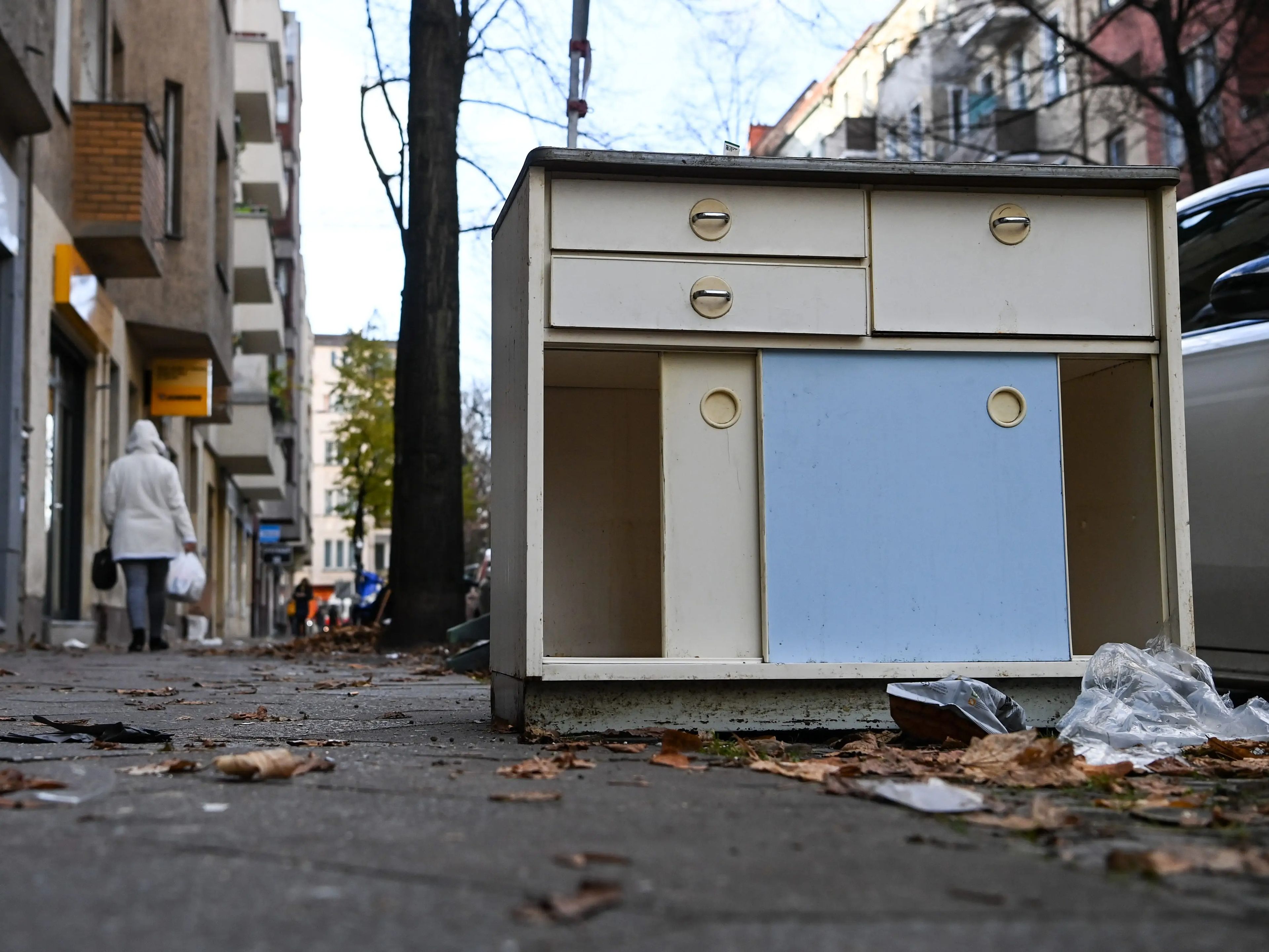 Unwanted furniture on a sidewalk in Berlin.