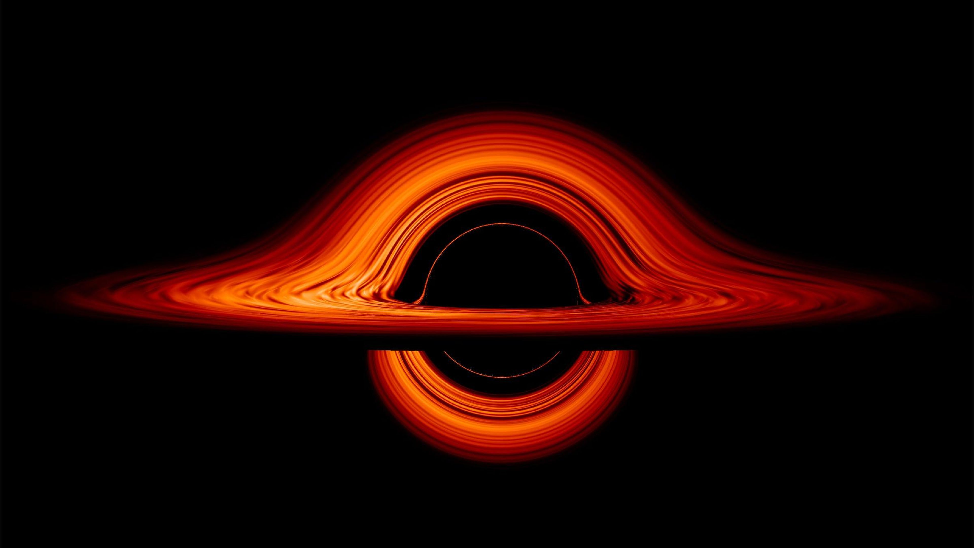 An animation of a black hole as viewed from the side.