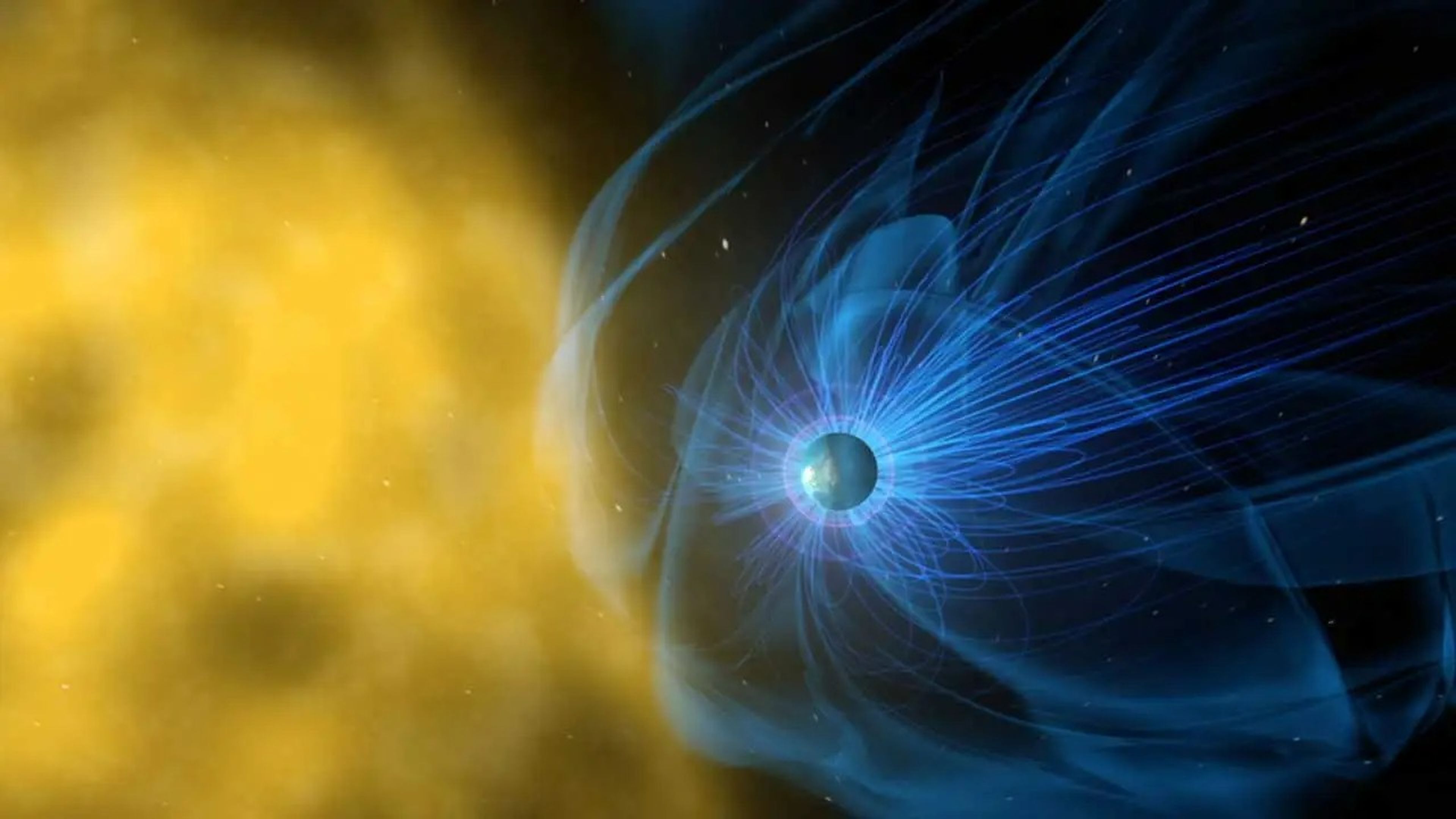Ilustración del campo magnético de la Tierra, en azul, que protege al planeta de la radiación solar.
