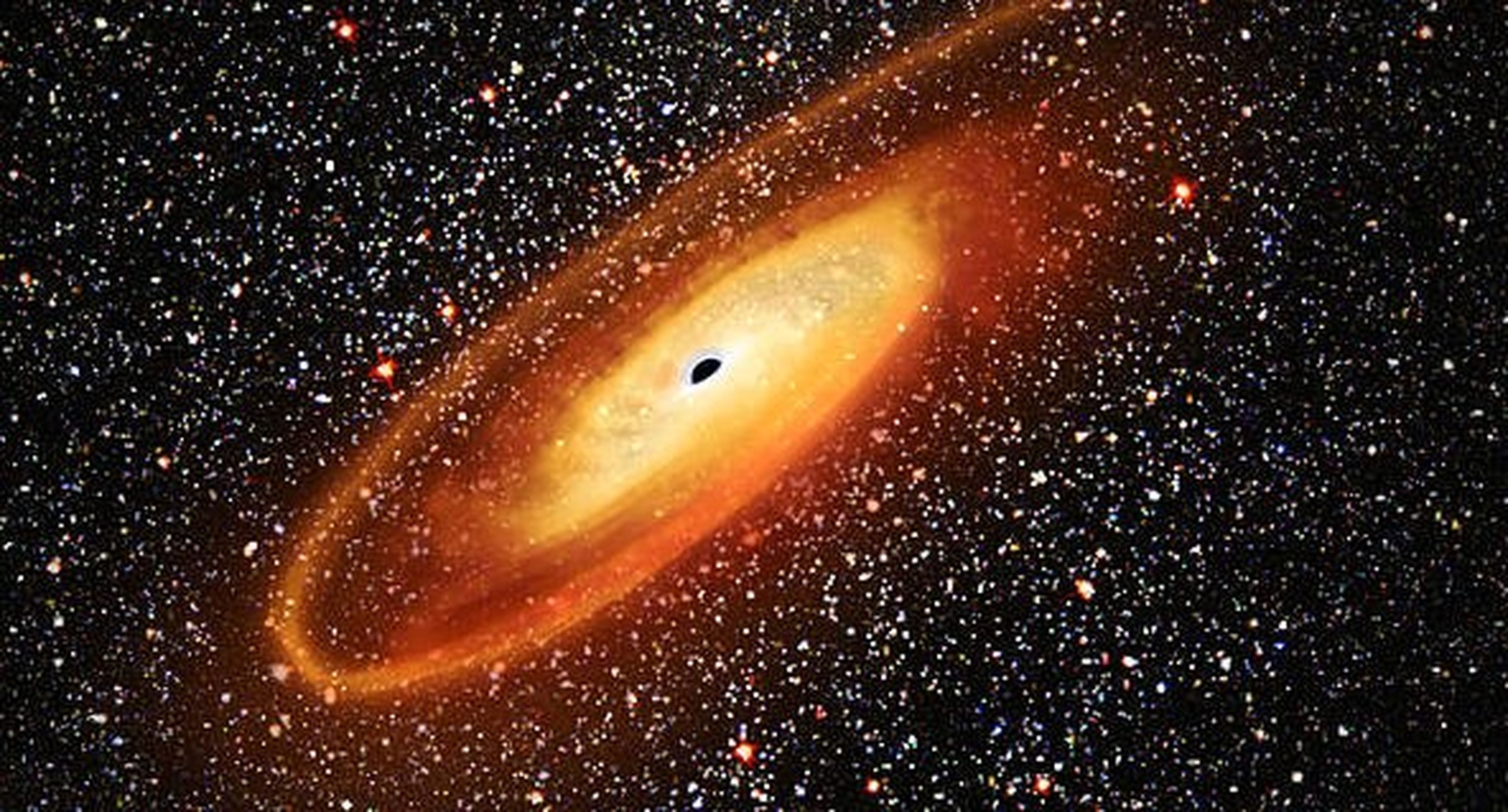 Esta ilustración de la NASA de un agujero negro muestra cómo está absorbiendo las estrellas a su alrededor, formando un disco de acreción alrededor del mismo.