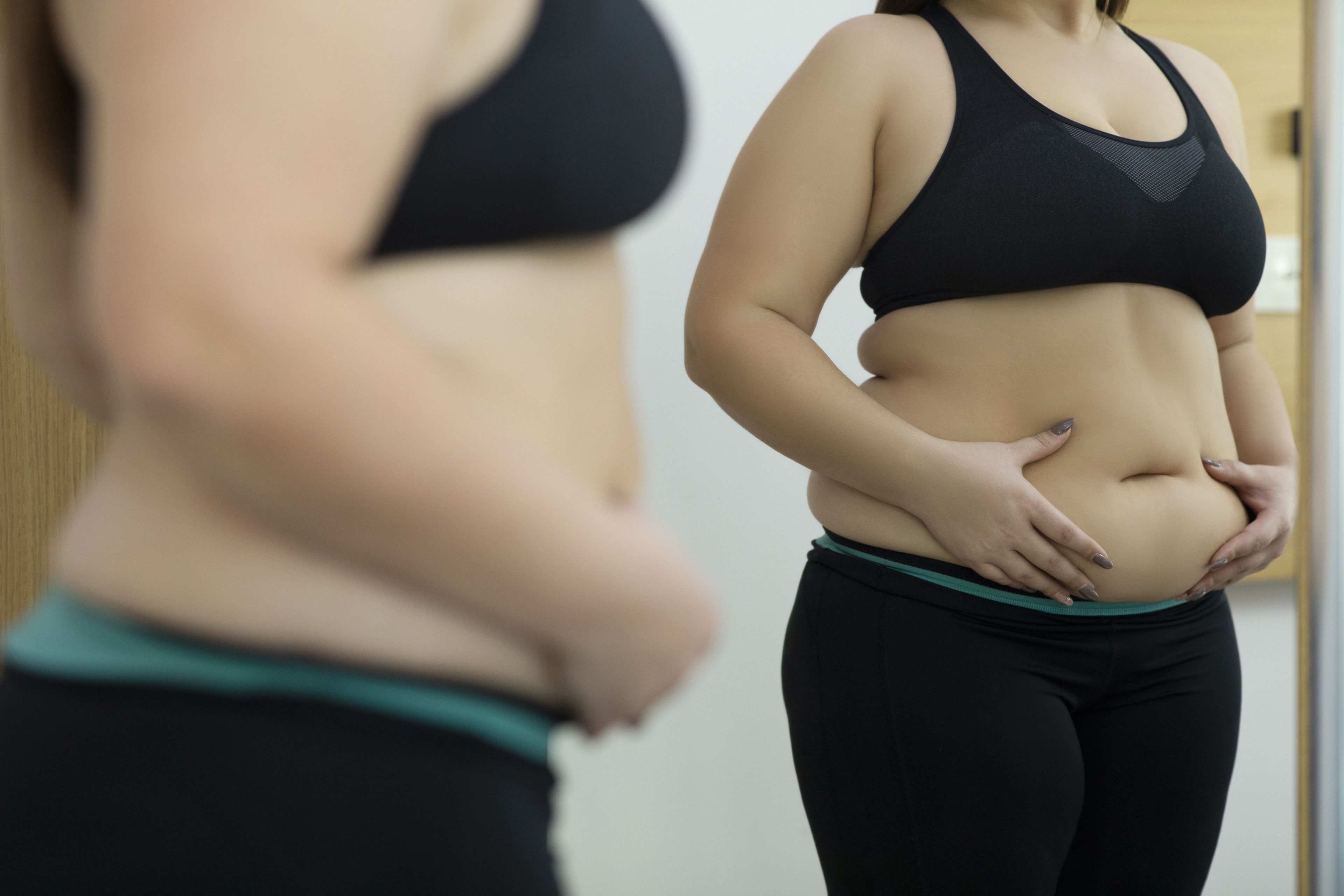 Señales que indican que necesitas perder grasa abdominal | Business Insider España