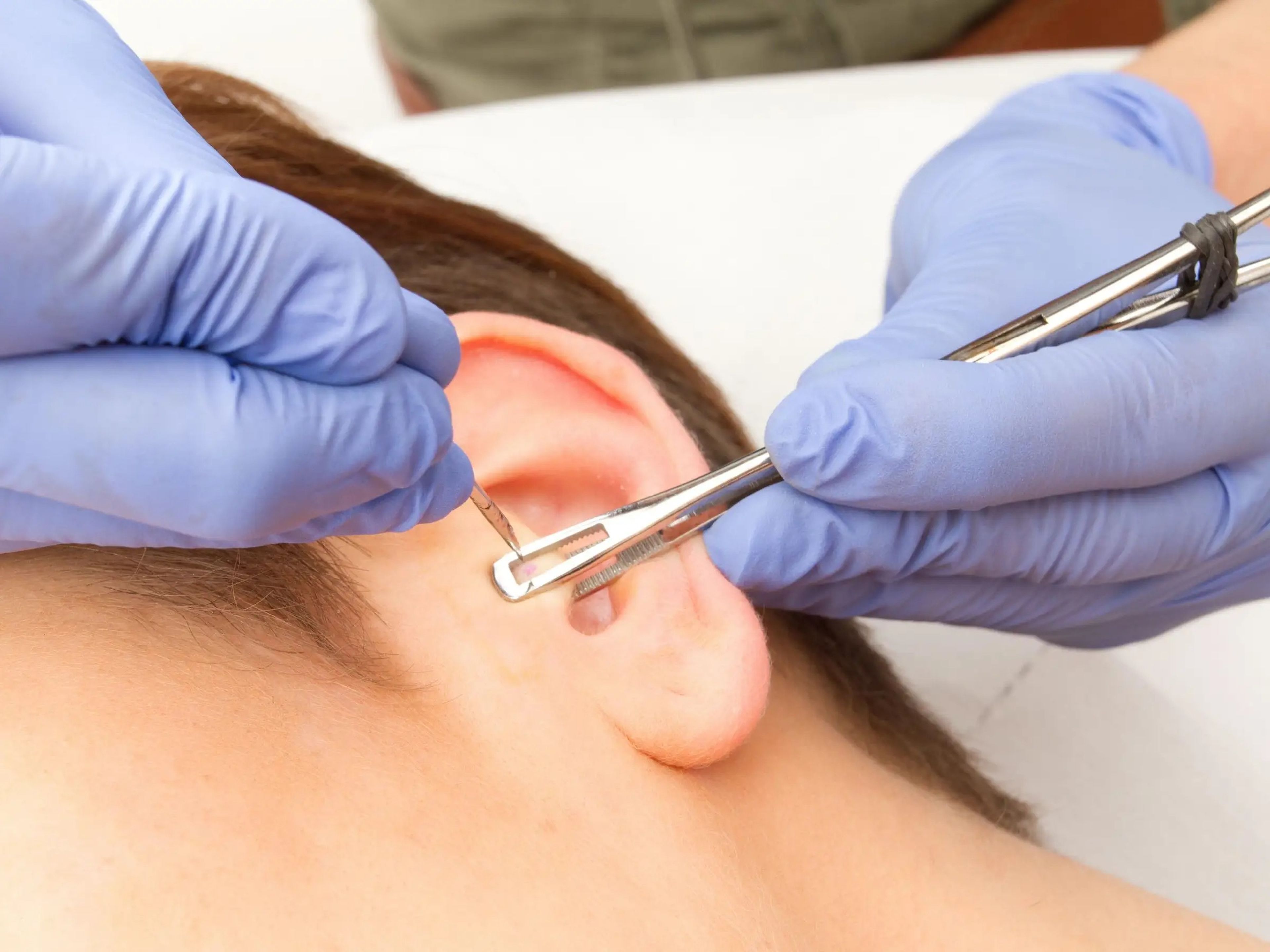 Experts shared with Insider different red flags to look out for when getting a new piercing.