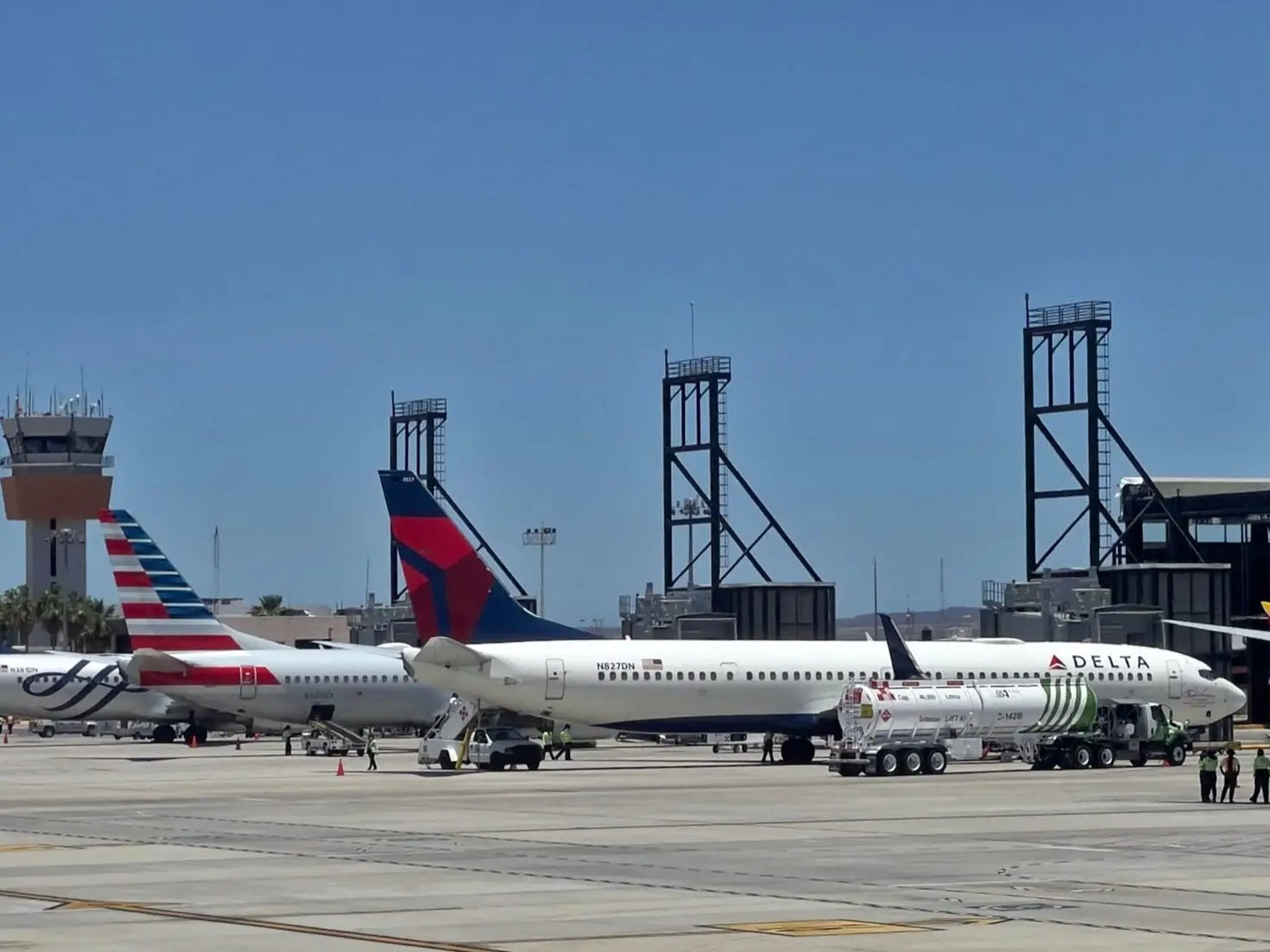 Southwest Airlines, Delta Air Lines, and American Airlines aircraft at an airport.
