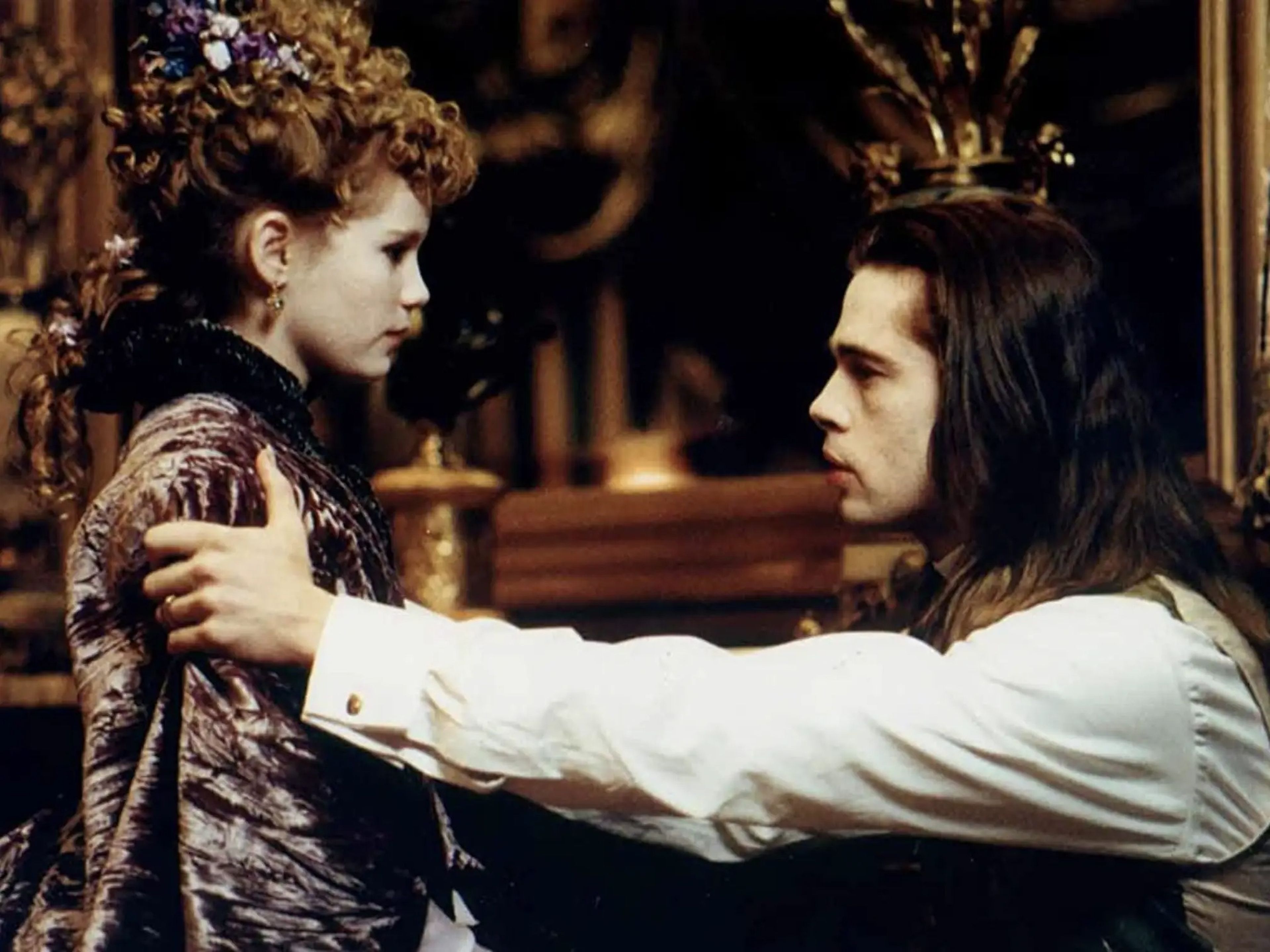 Kirsten Dunst y Brad Pitt en 1994 filmando 'Entrevista con el vampiro'.
