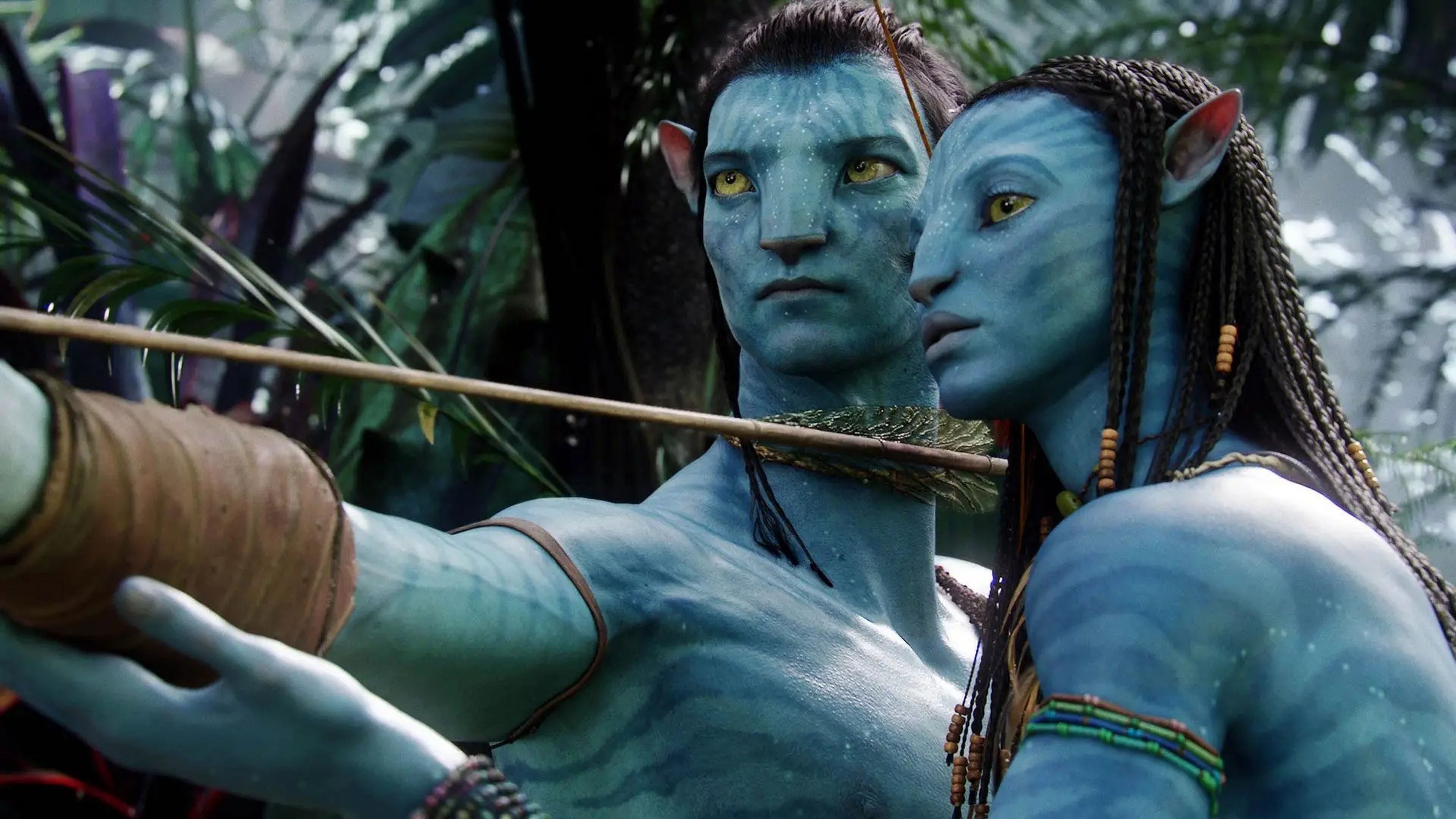 Jake Sully (Sam Worthington) y Neytiri (Zoe Saldaña) en 'Avatar'.