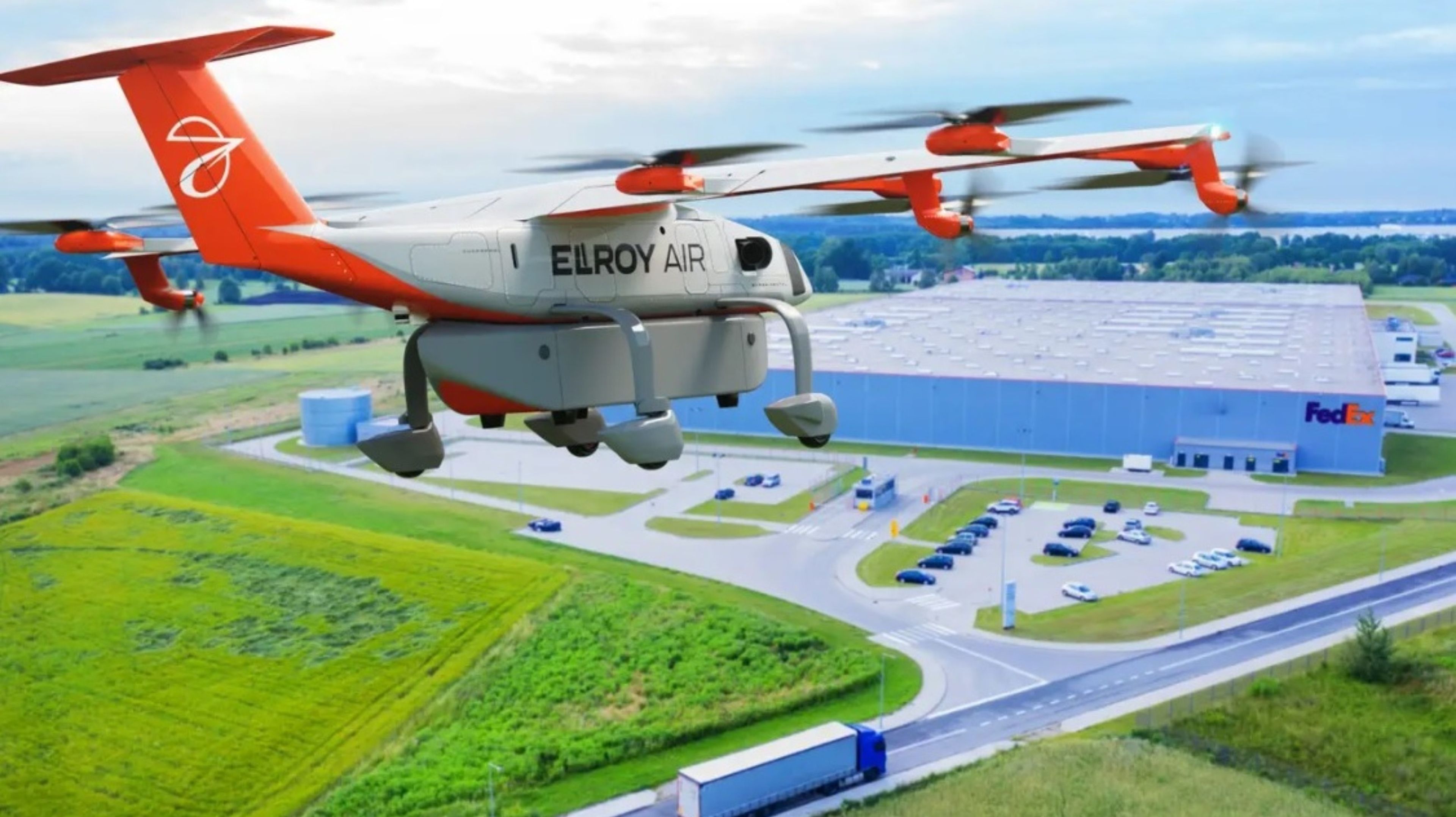 Un avión de carga eléctrico de Elroy Air vuela sobre una autopista y un almacén de FedEx.