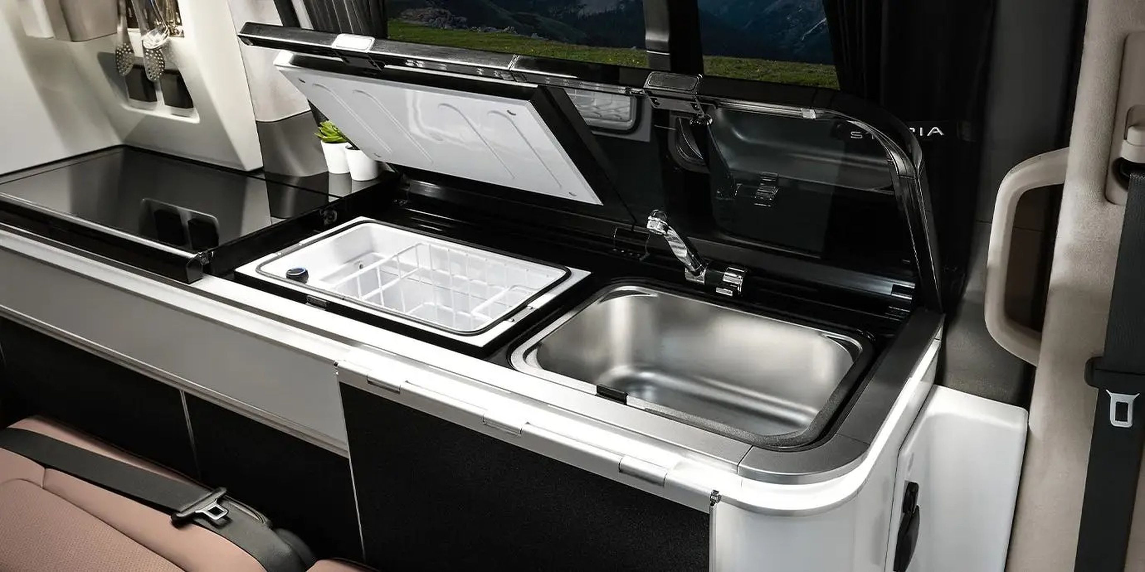 The Hyundai Staria Lounge Camper's kitchen with a sink