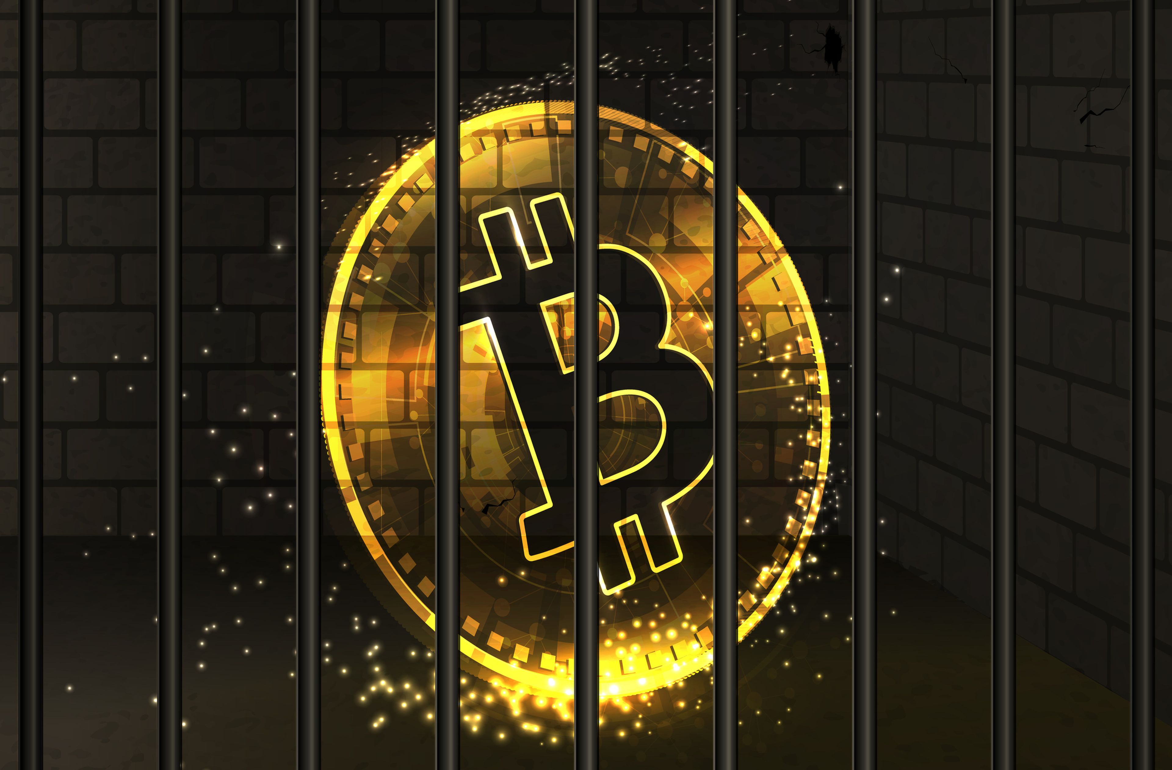 Ilustración de un bitcoin entre rejas.