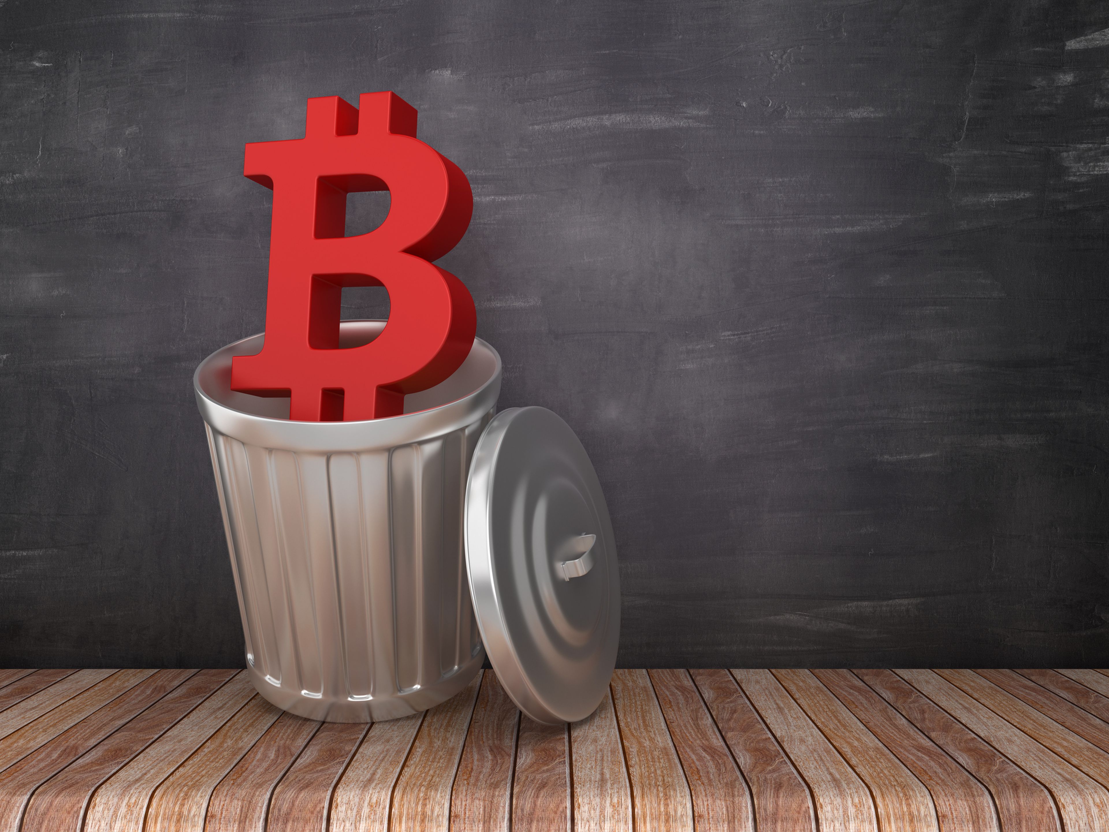 Una ilustración con el símbolo de bitcoin en la basura.