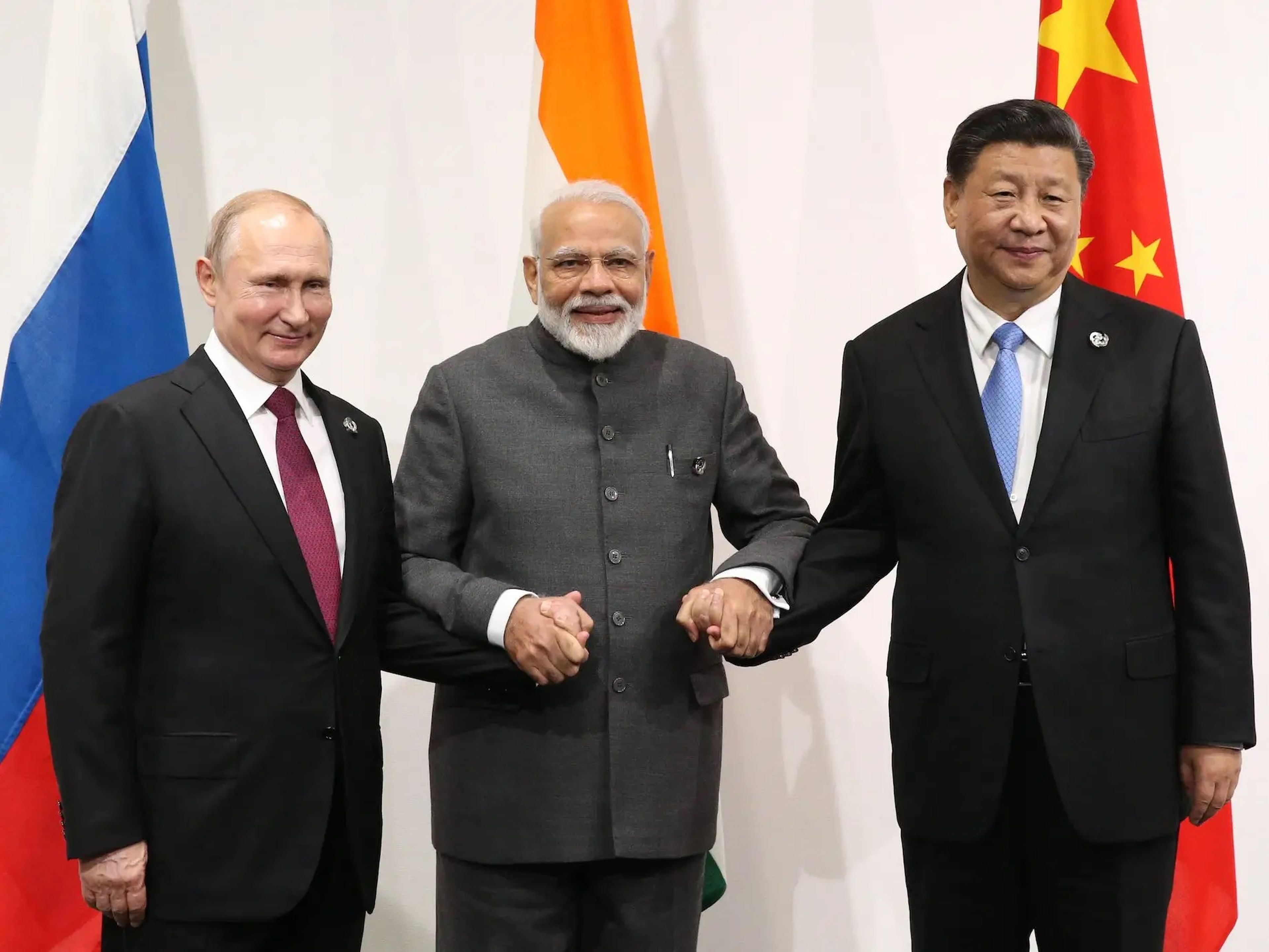 Vladímir Putin, presidente de Rusia; Narendra Modi, primer ministro de India; y Xi Jinping, líder de China.