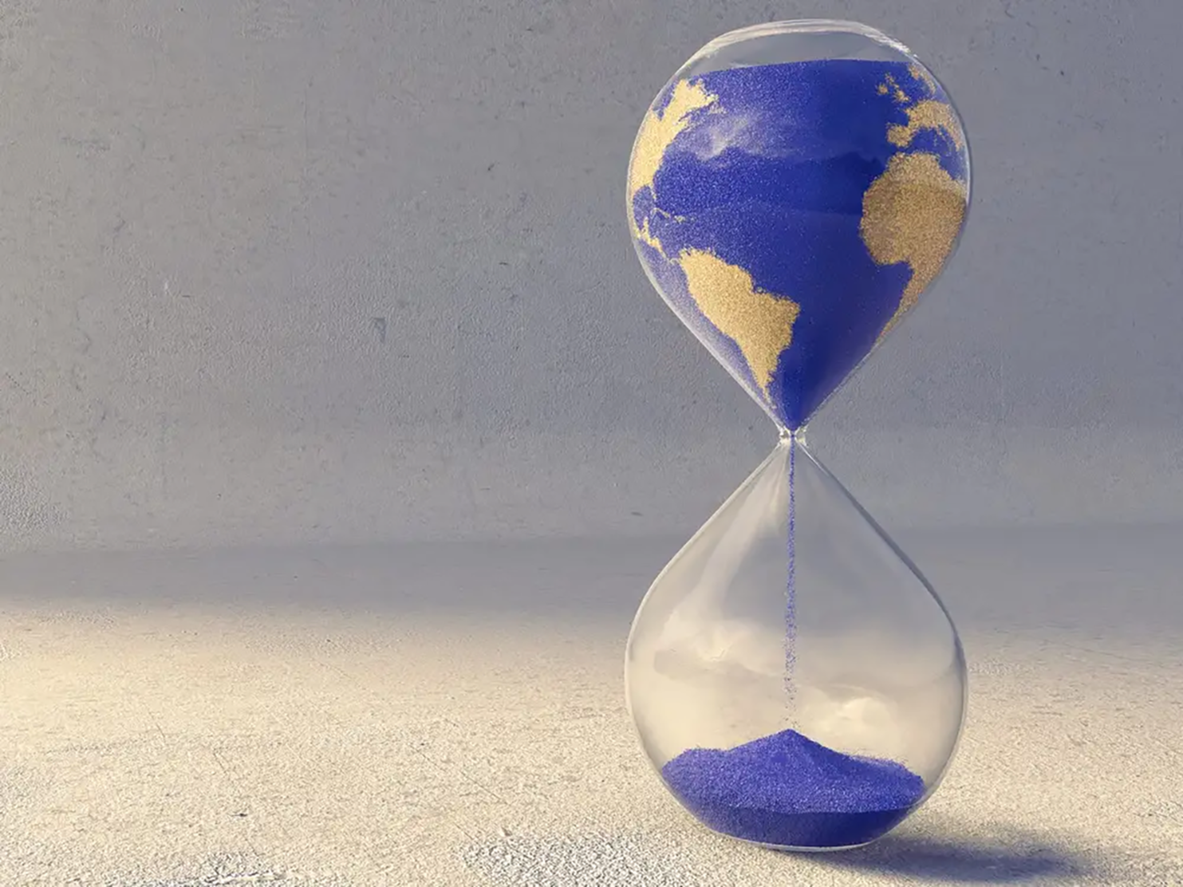 Reloj de arena con la Tierra