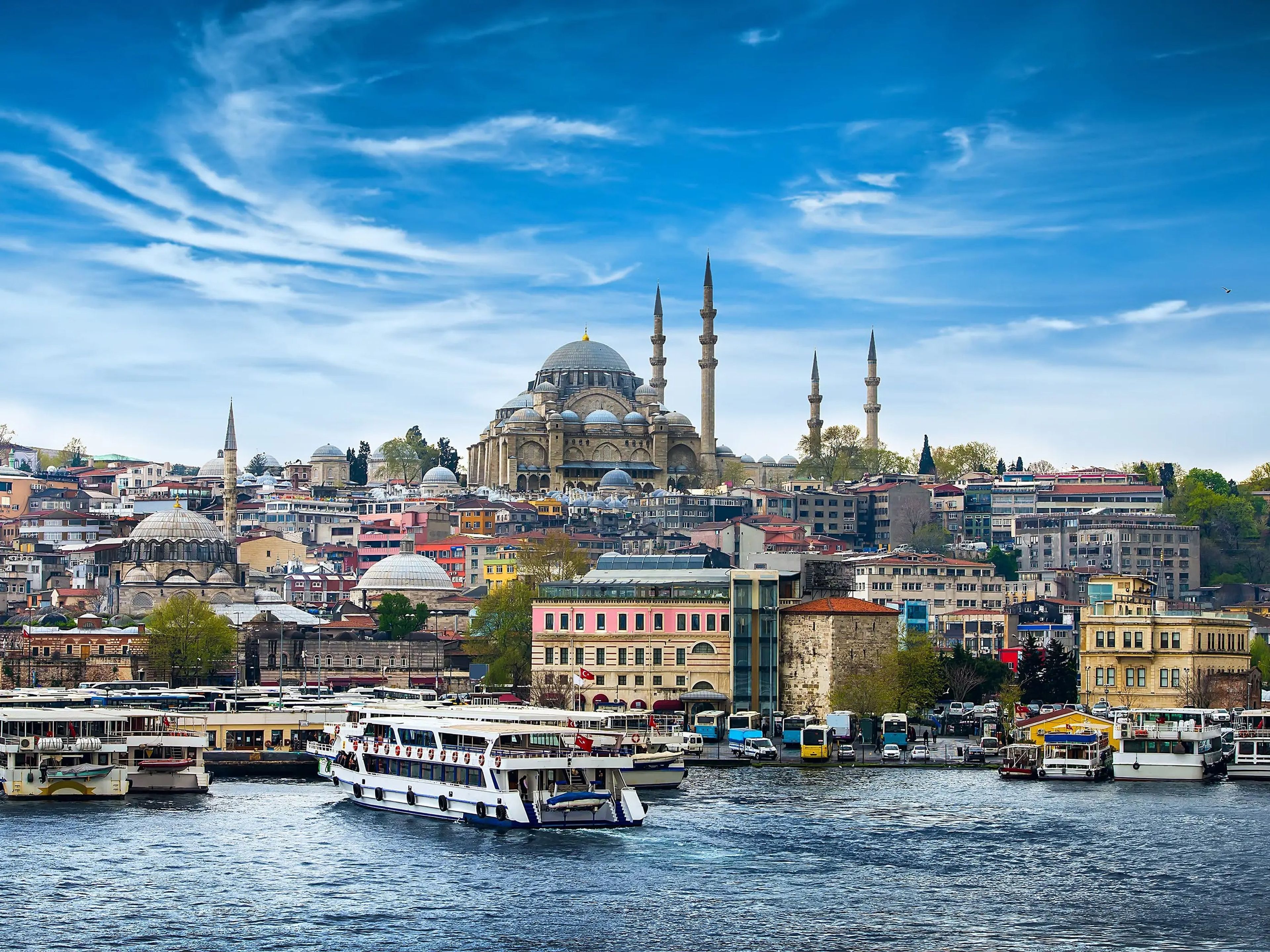 A view of the city skyline and waterfront with boats in Istanbul, Turkey