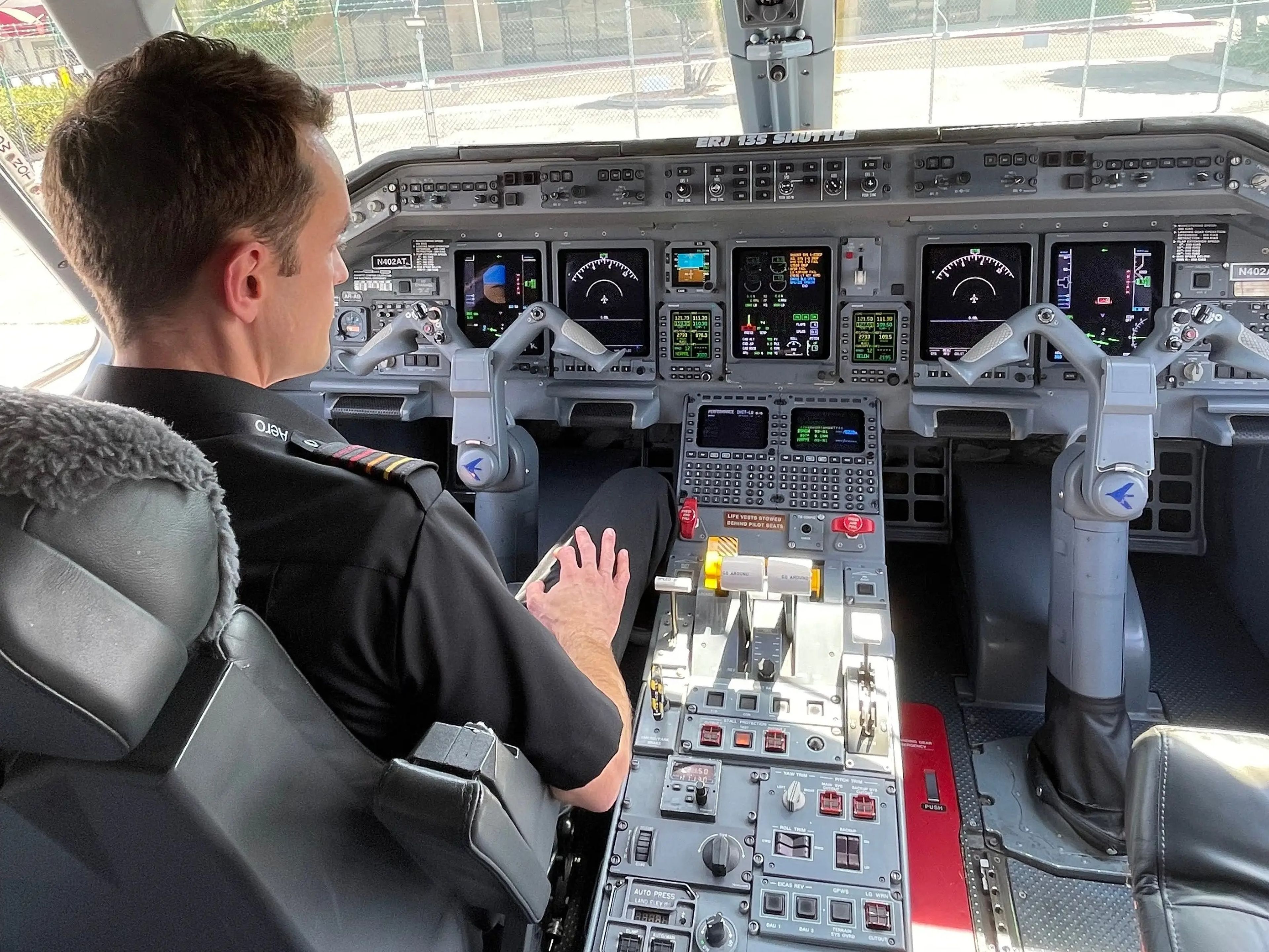 Captain Brent preparing to explain the cockpit’s features.