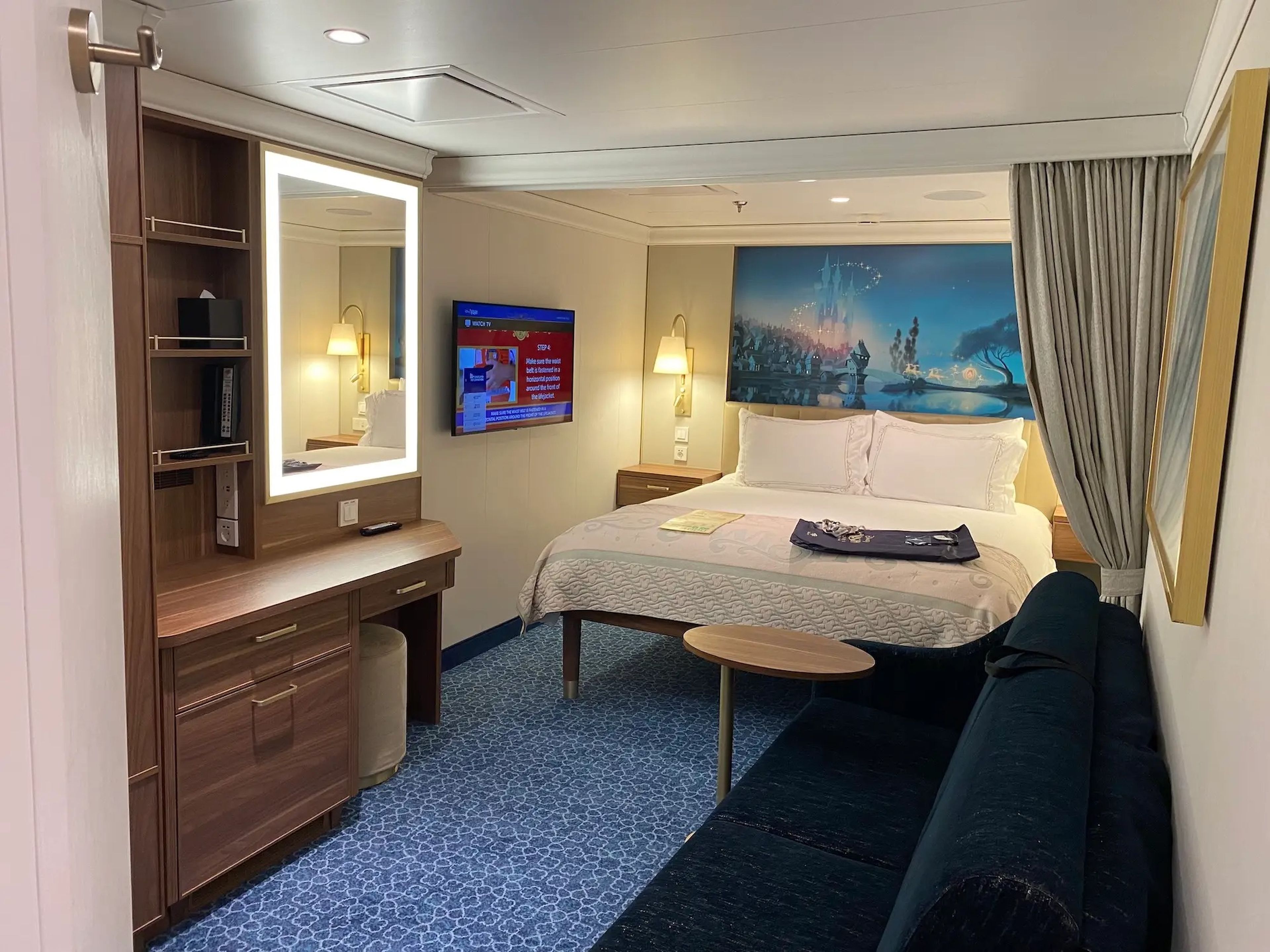 Inside a standard stateroom aboard the Disney Wish cruise ship.