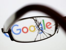 BERLIN, GERMANY - SEPTEMBER 03: Posed scene on the topic google, cracked and broken glasses in front of the google company logo on September 03, 2015 in Berlin, Germany. Photo by Thomas Trutschel/Photothek via Getty Images)