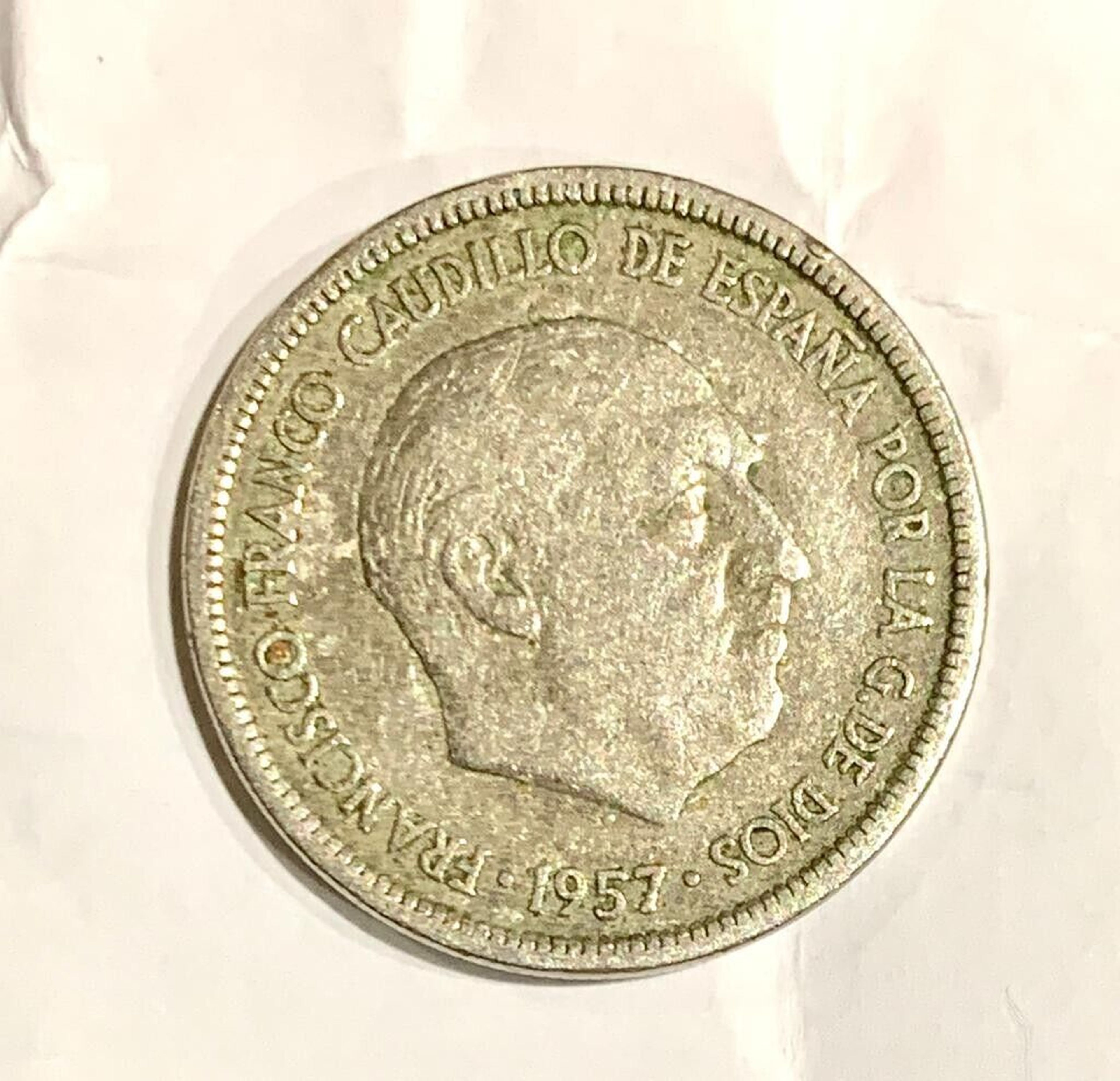 moneda de 5 pesetas de 1957 (cara de Franco)