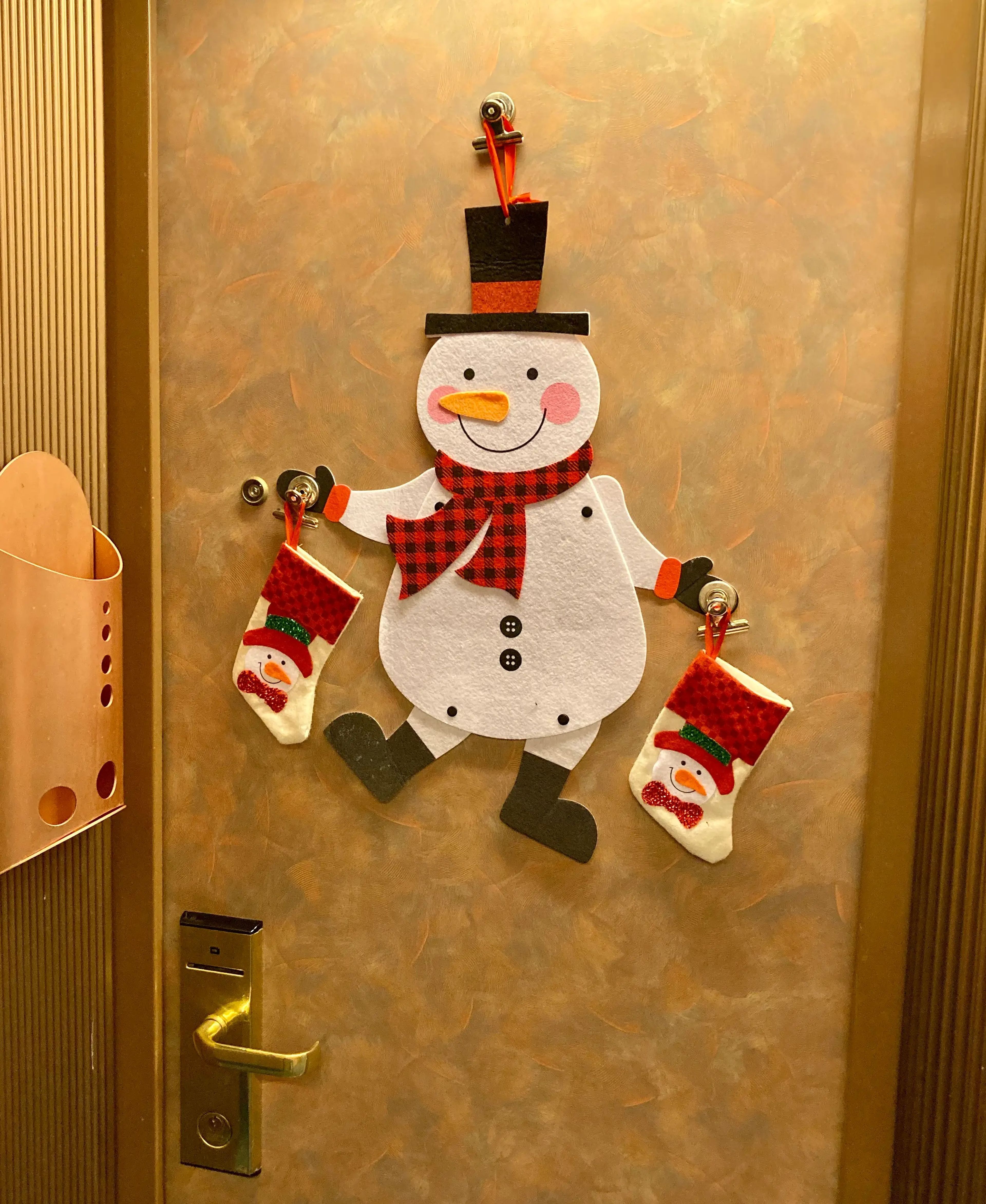 holiday decorations on cruise cabin door