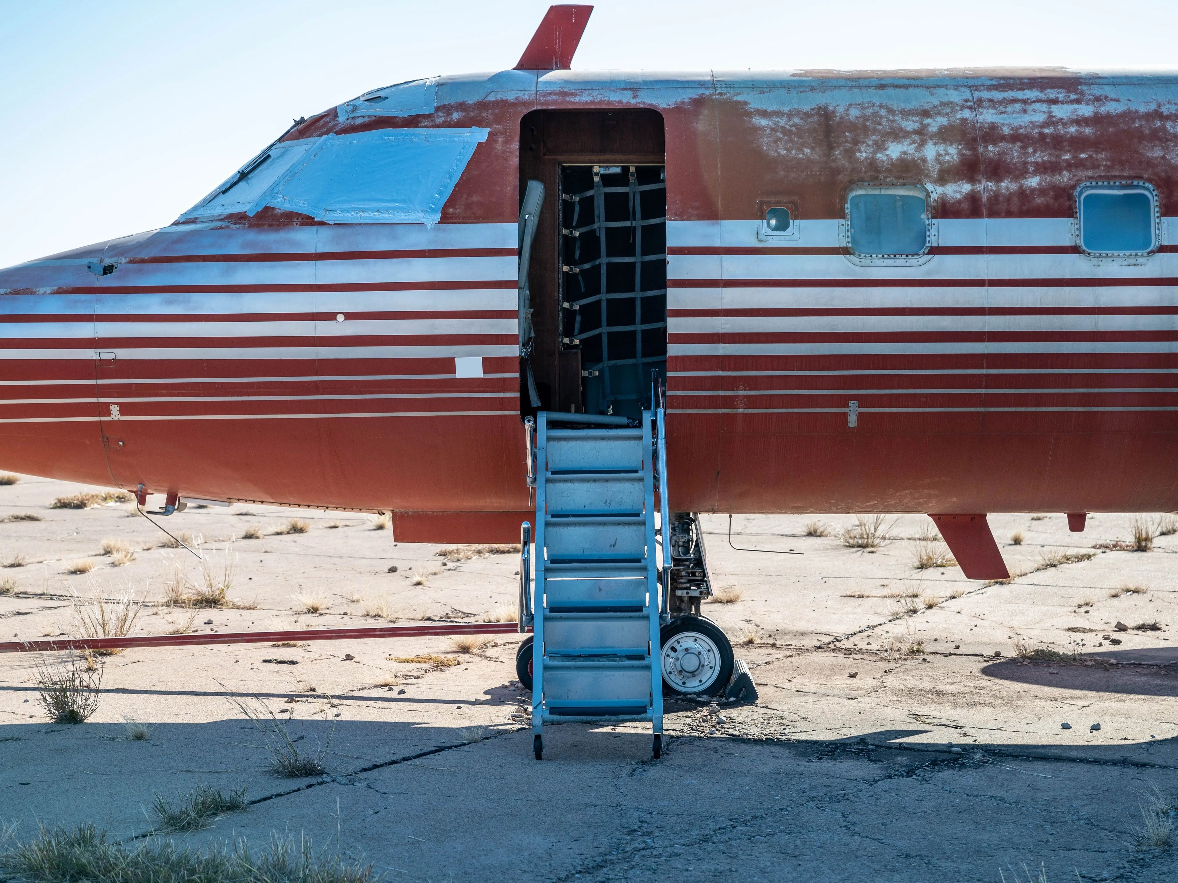 Photo of a private plane with the stairs shown