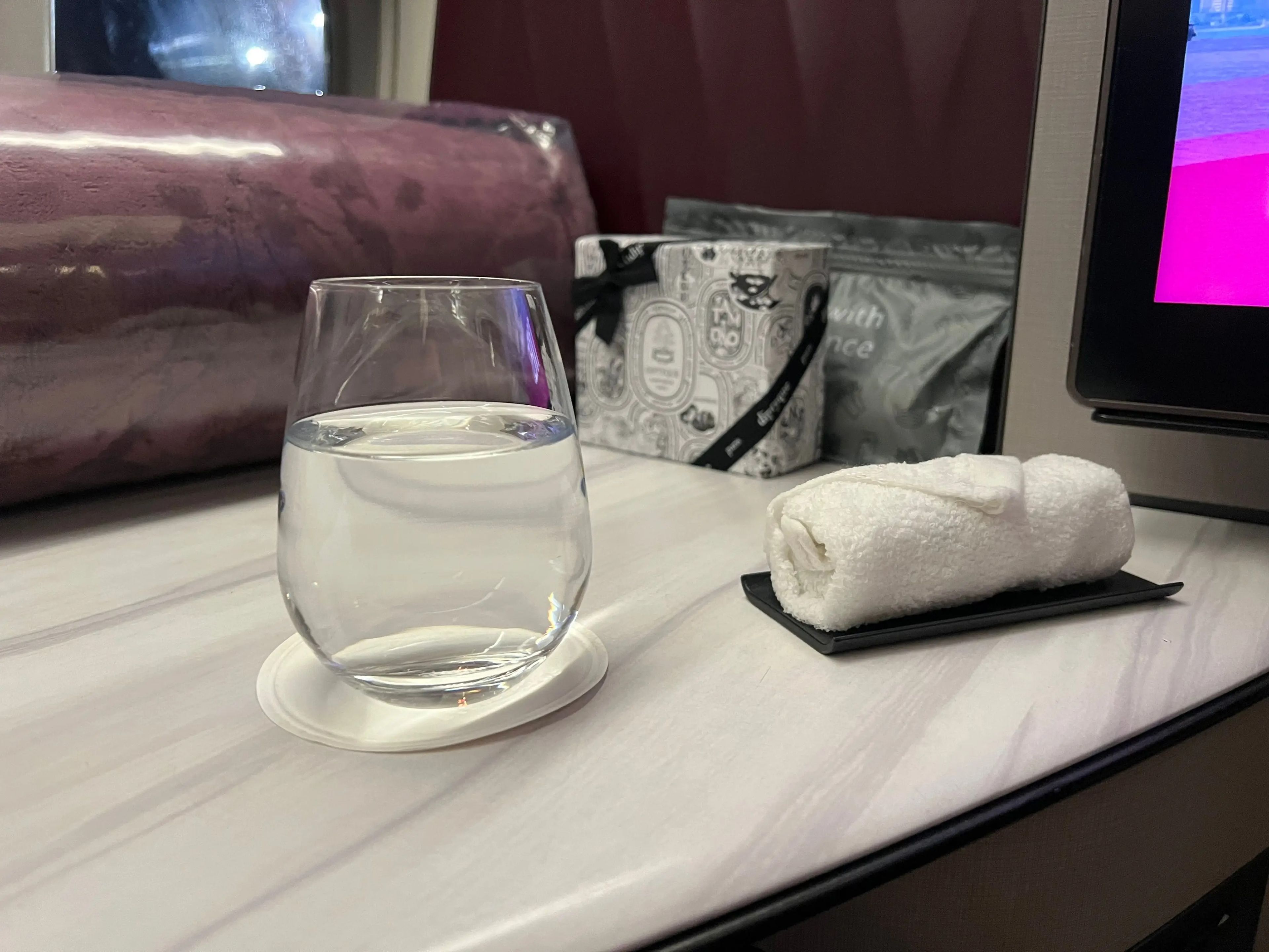 A beverage and warm toilette were given before taking off.