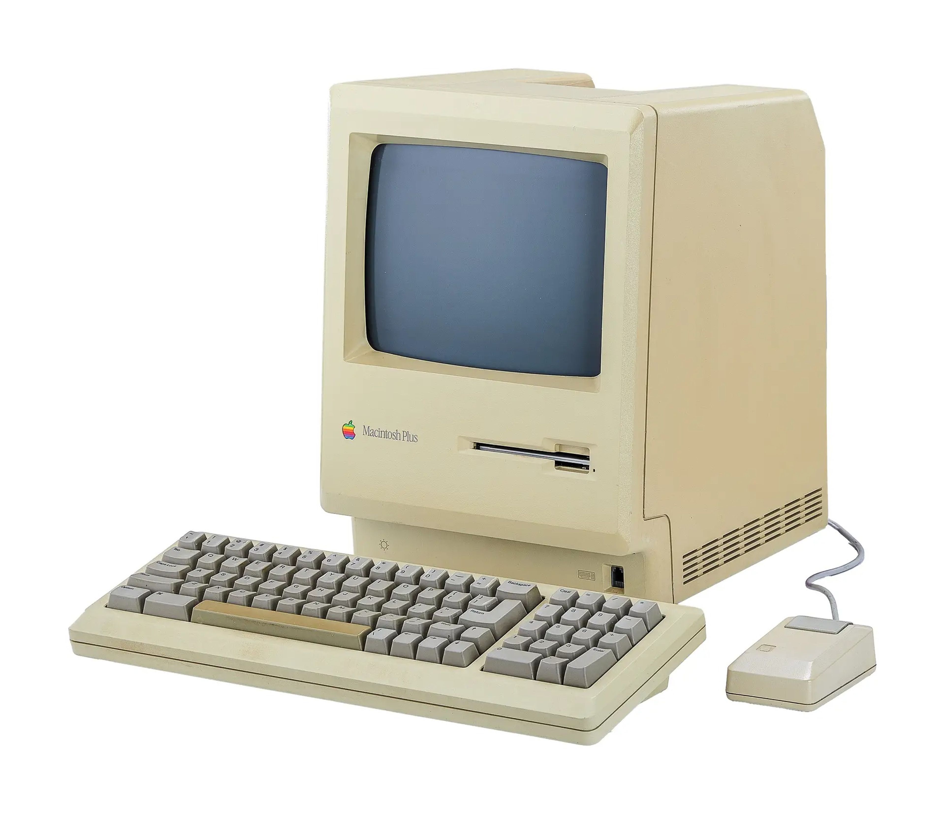1986 Apple Macintosh Plus computer including a keyboard and mouse