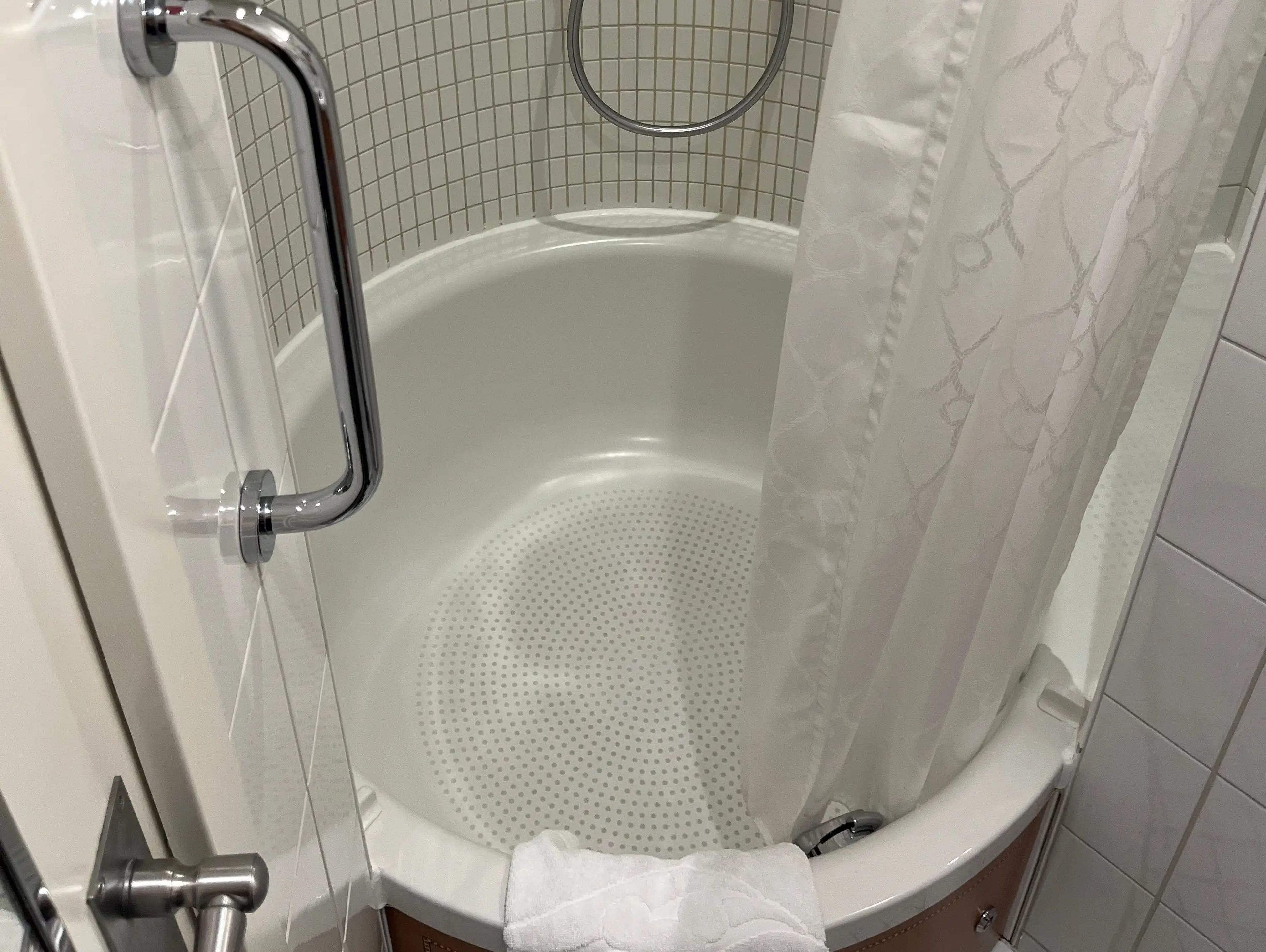 circular shower/tub in a family stateroom on a disney cruise ship