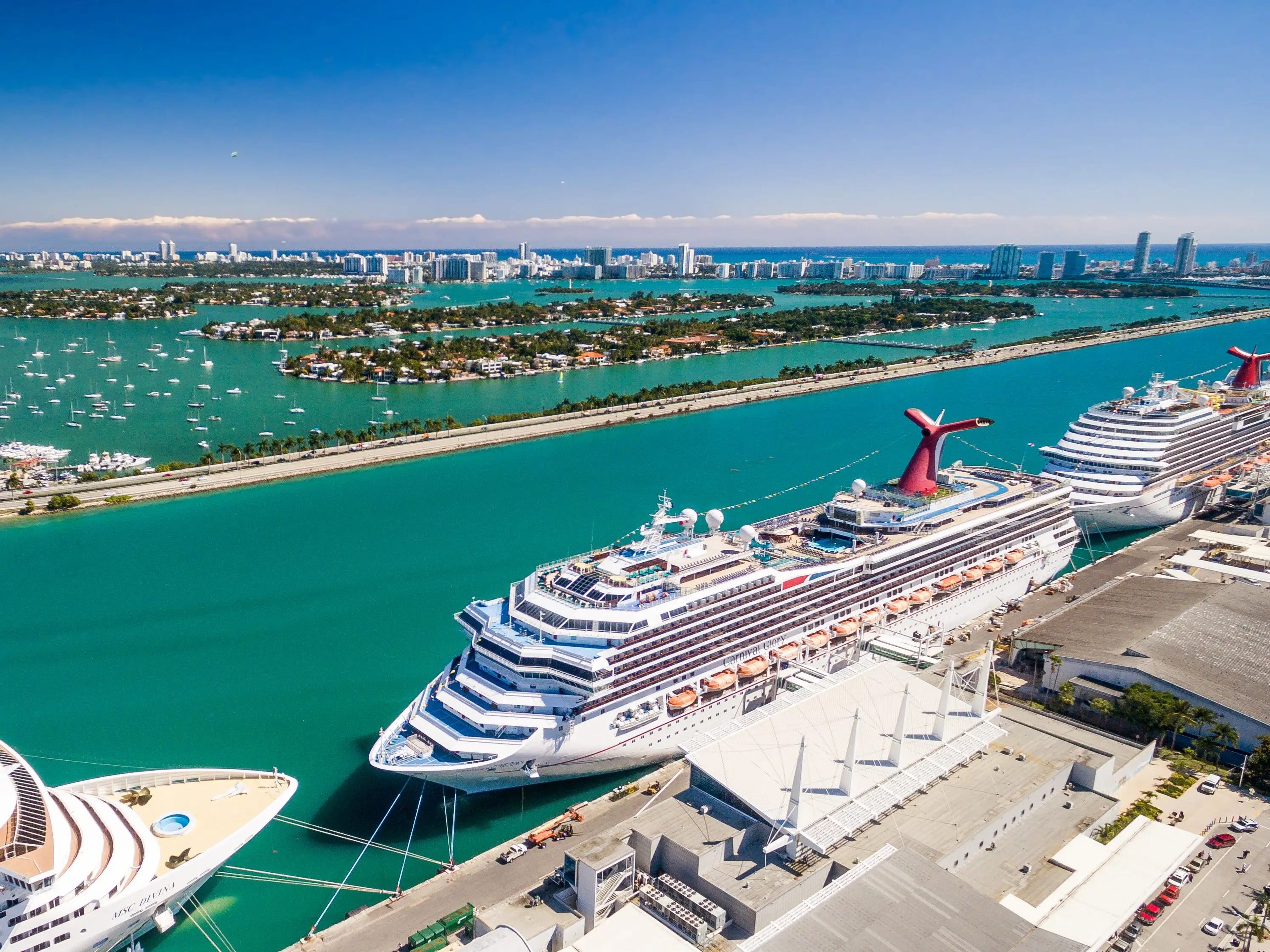 port of miami with cruise ships docked in blue-green waters