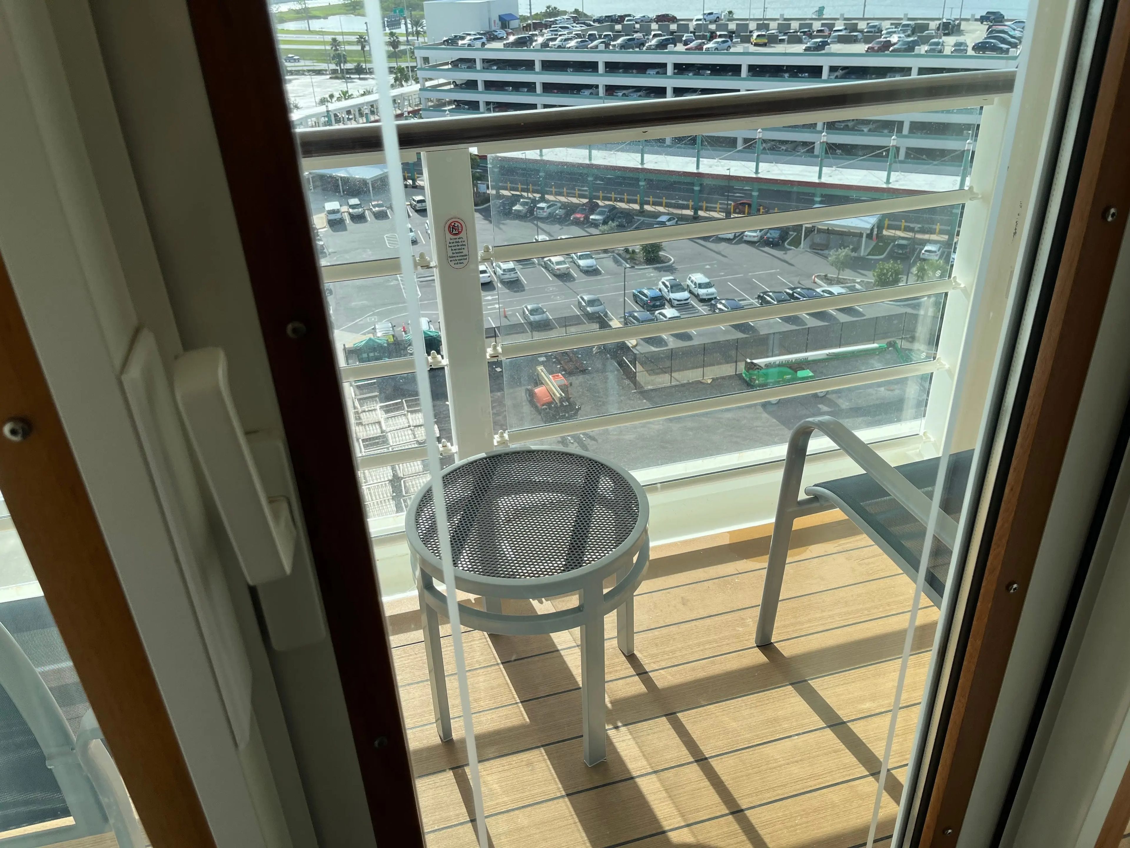 view of the attached patio/veranda in a family oceanview stateroom on the disney fantasy cruise ship