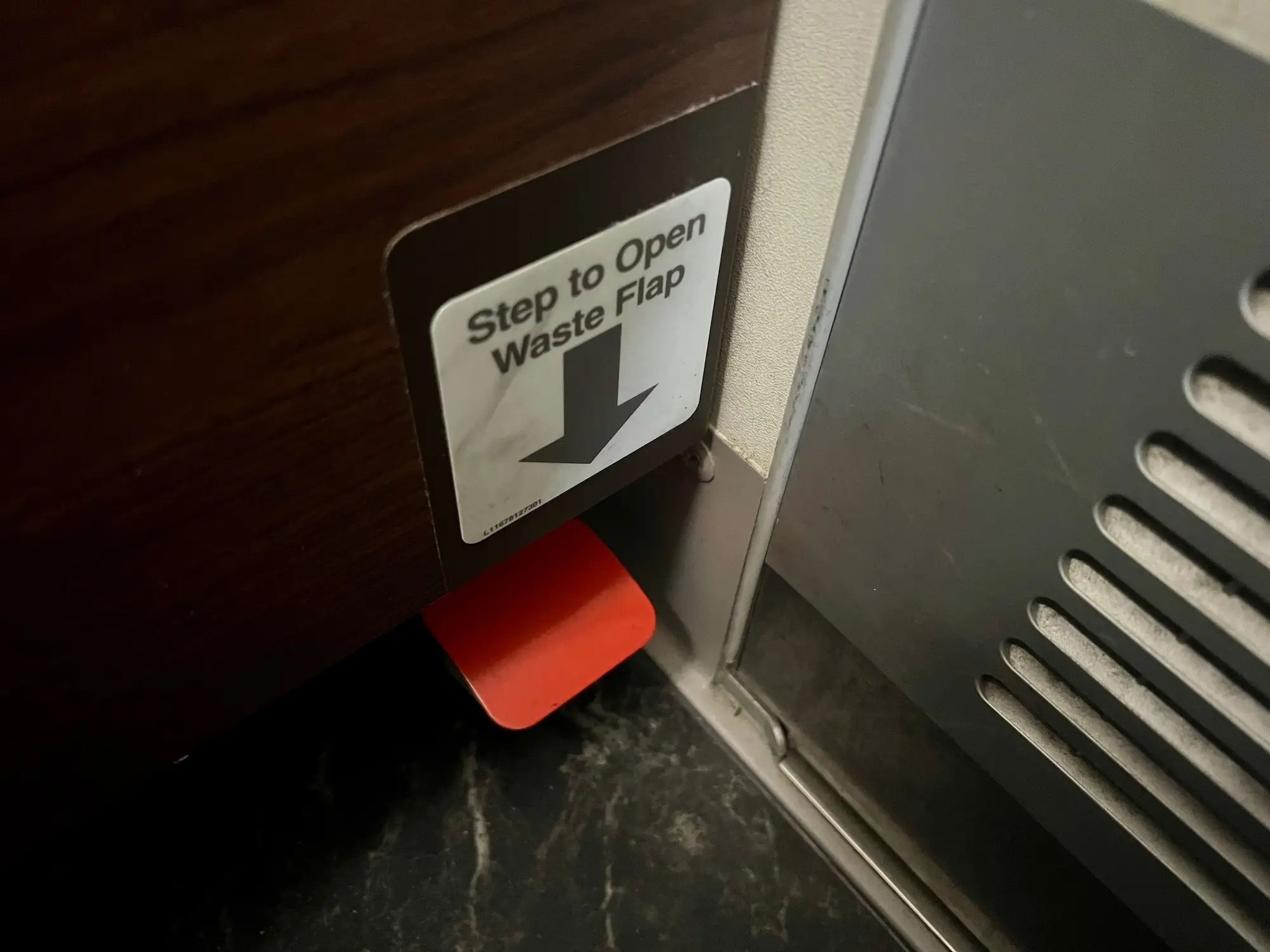 The waste bin step opener in Singapore's A380.