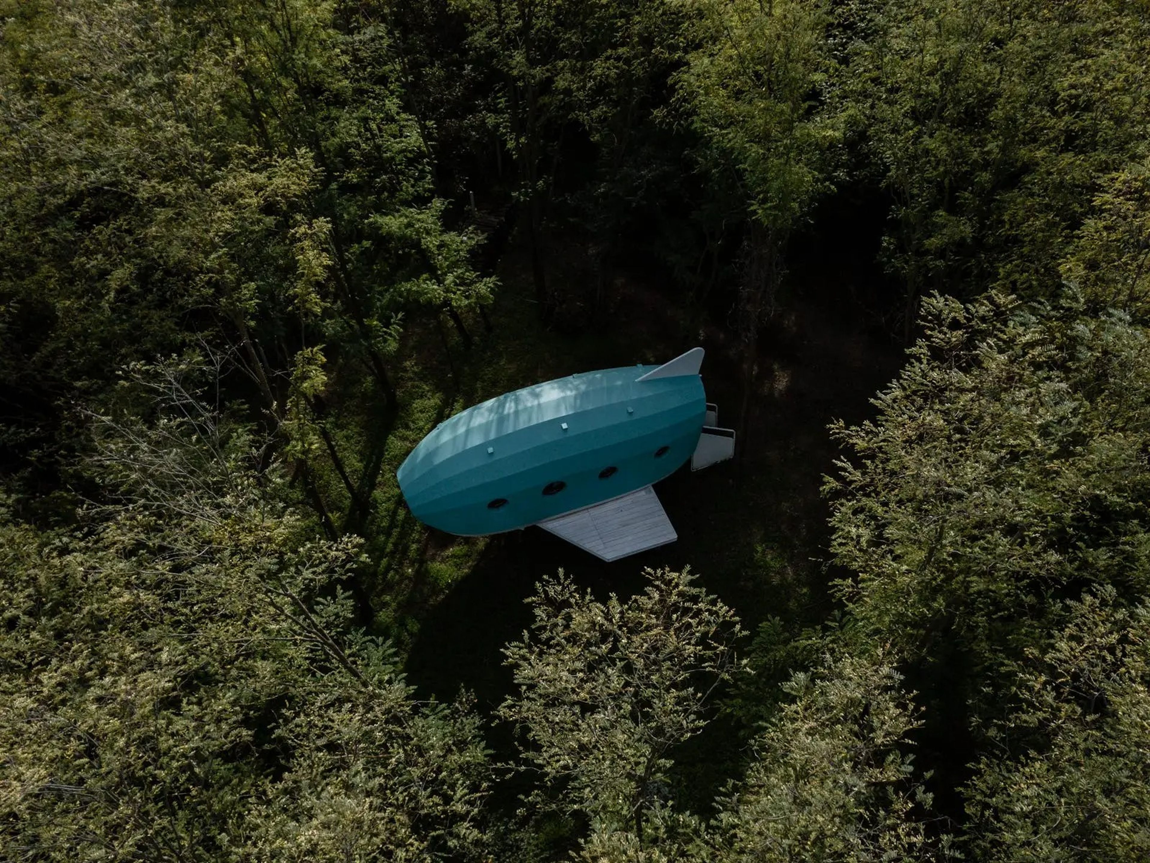 An aerial view of the Jet House, which is situated in a mini-forested area.