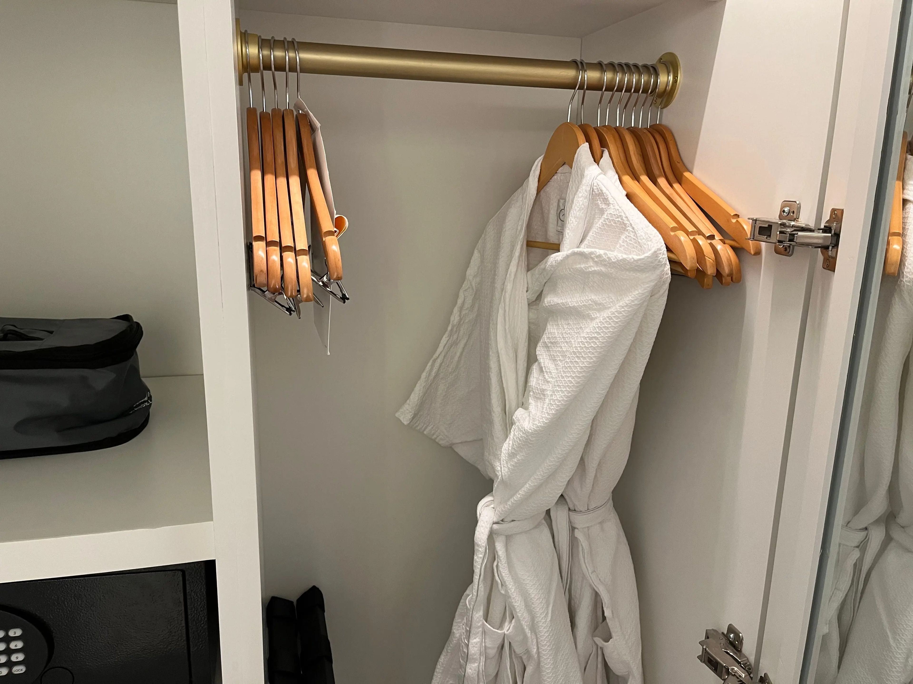 closet with hangers and robes in a room at the grand floridian resort