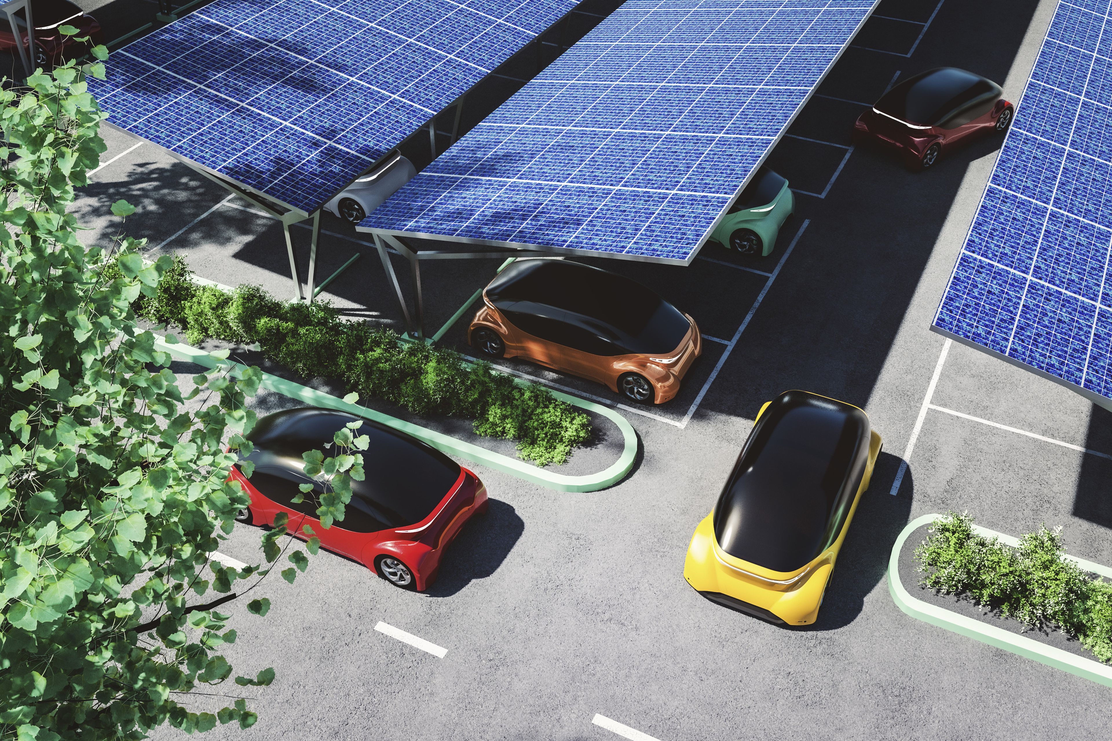 Coches aparcados en una estación de carga solar.