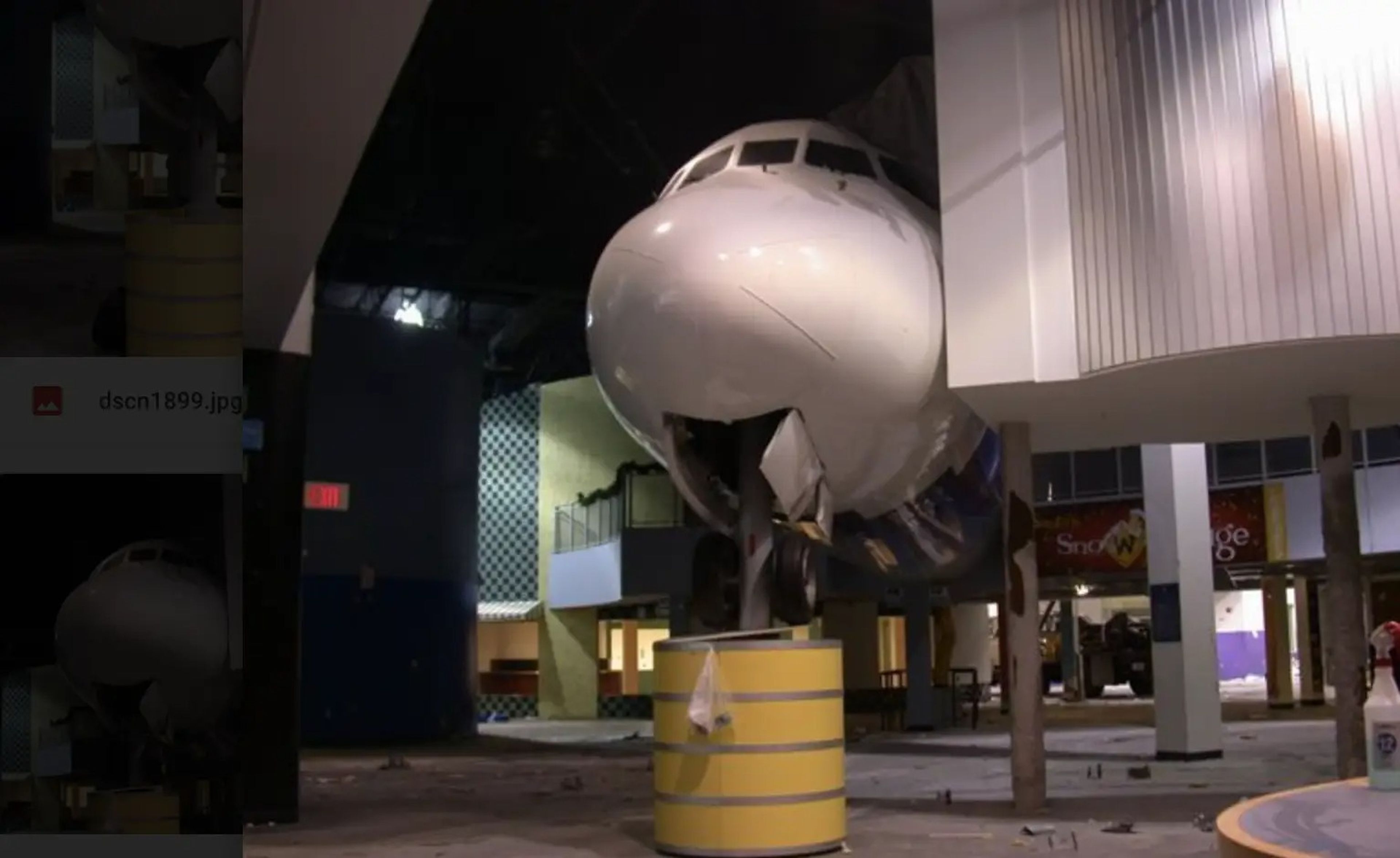The DC-9 Spirit Airlines plane inside a derelict mall in Florida where it was being used as a display.