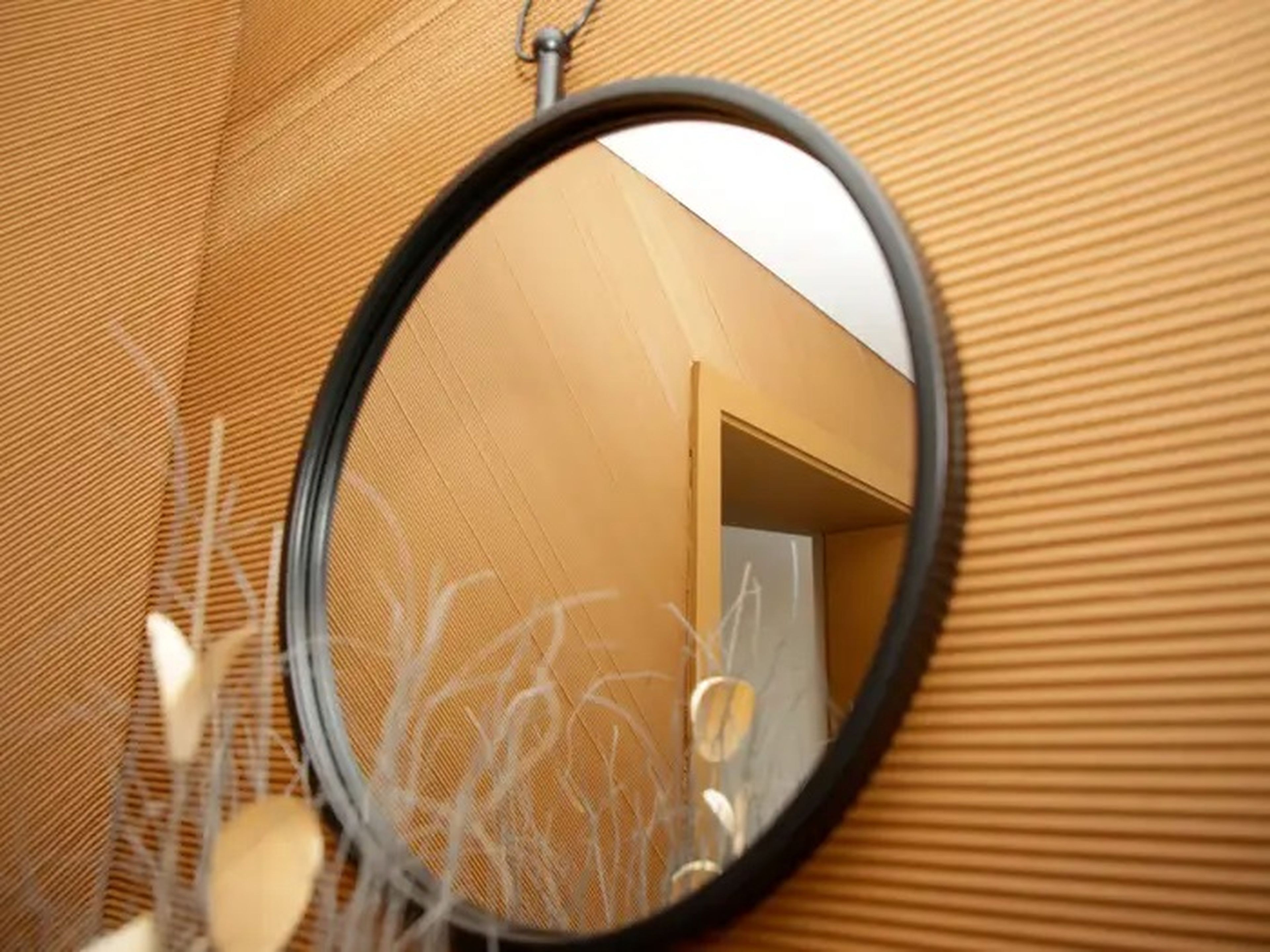 Un espejo en la vivienda en 3D.