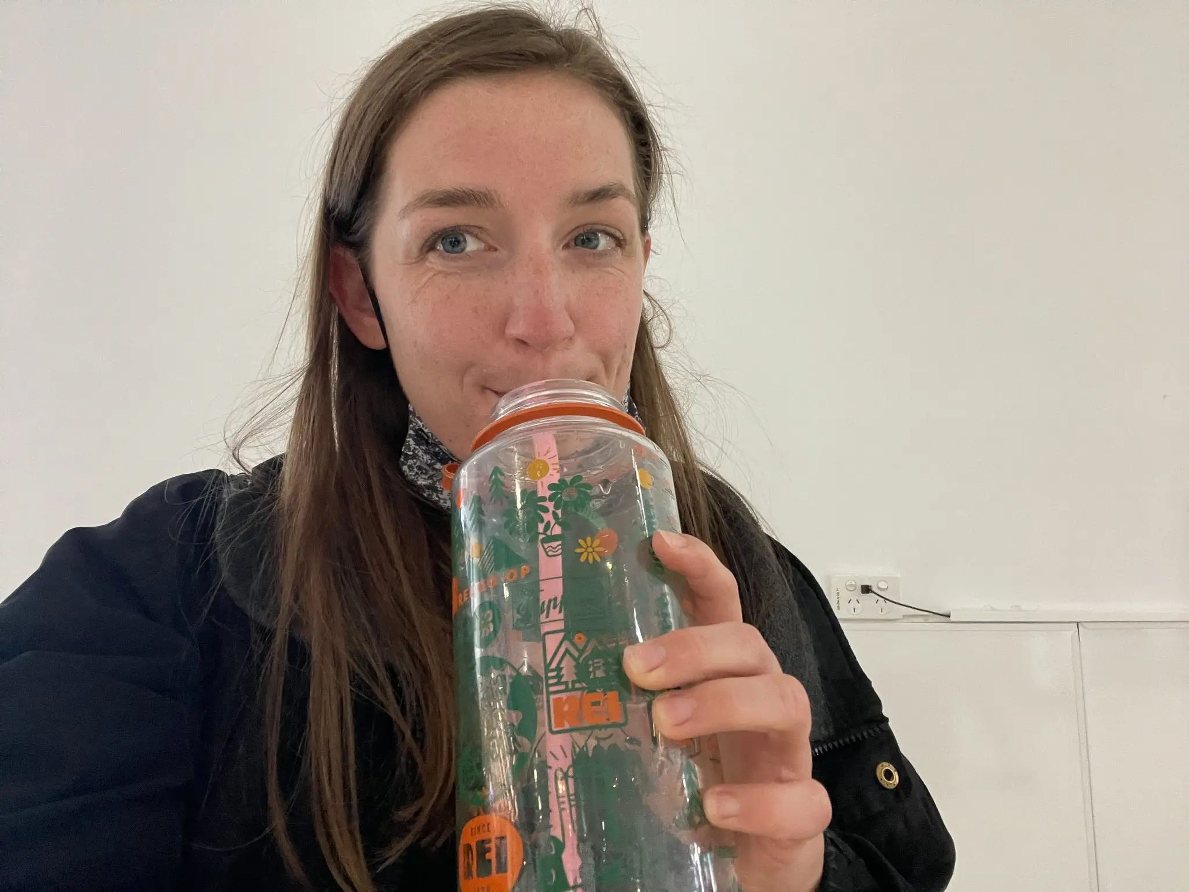 Insider's author drinks from a reusable water bottle.