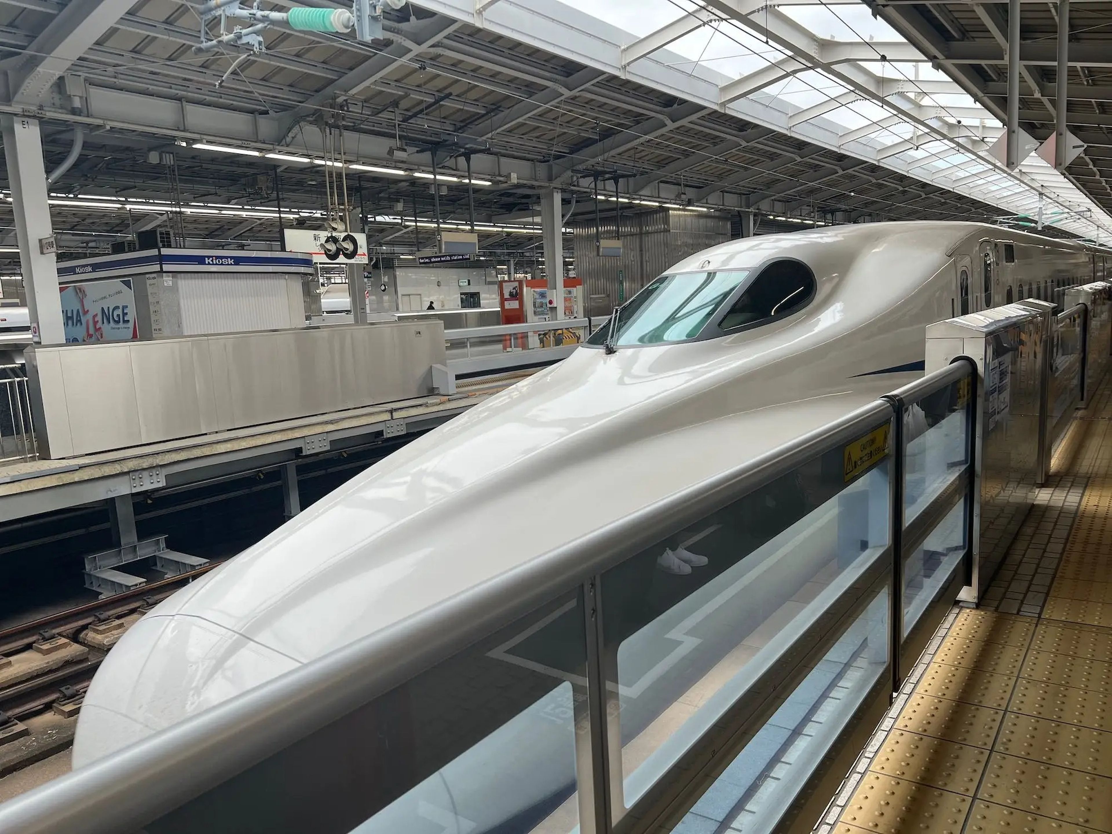 The needle-nose tip of the bullet train at Osaka Station.