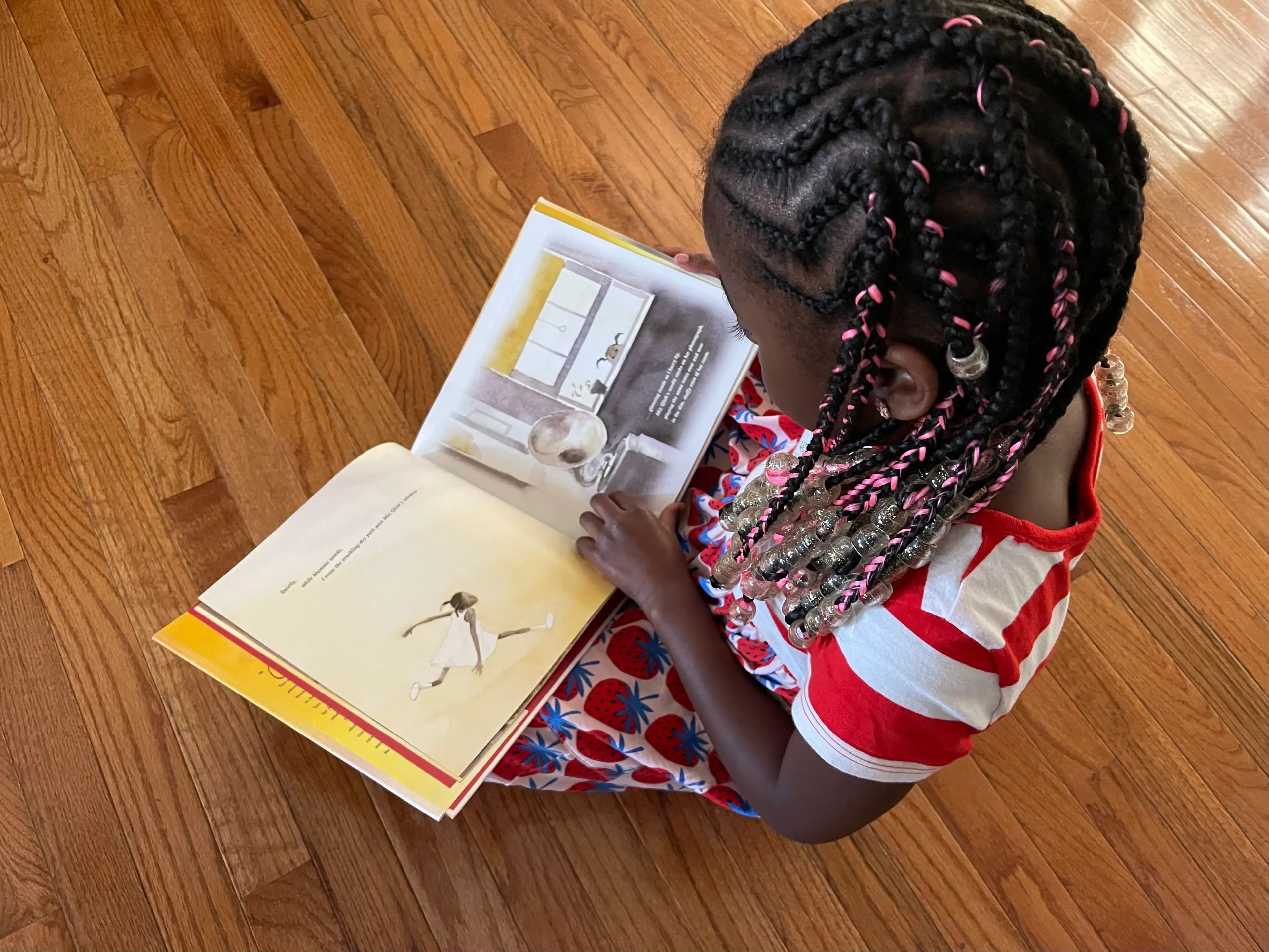 One of Rachel Garlinghouse's kids reading a book