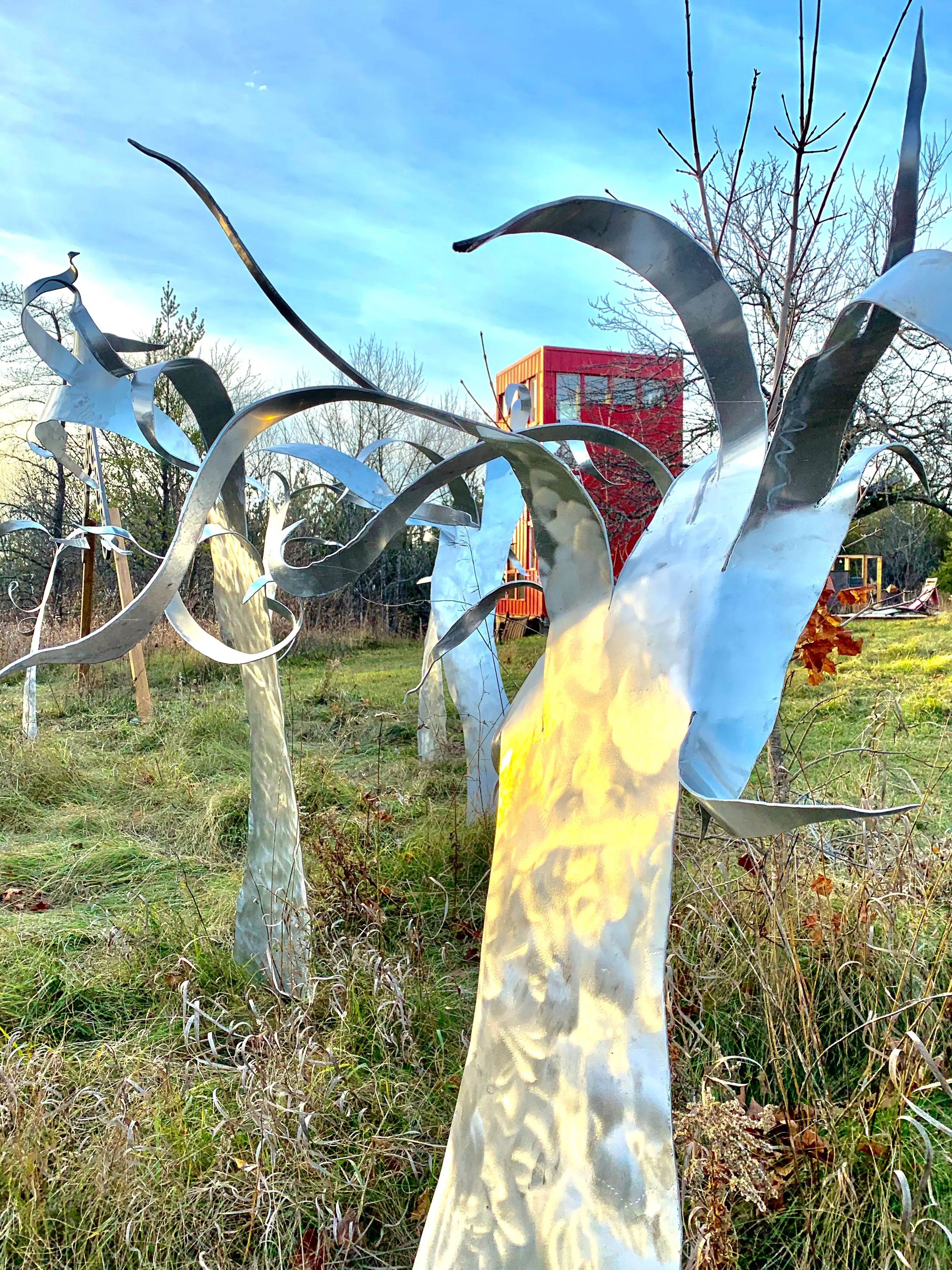 Photos of the metal forest art installation