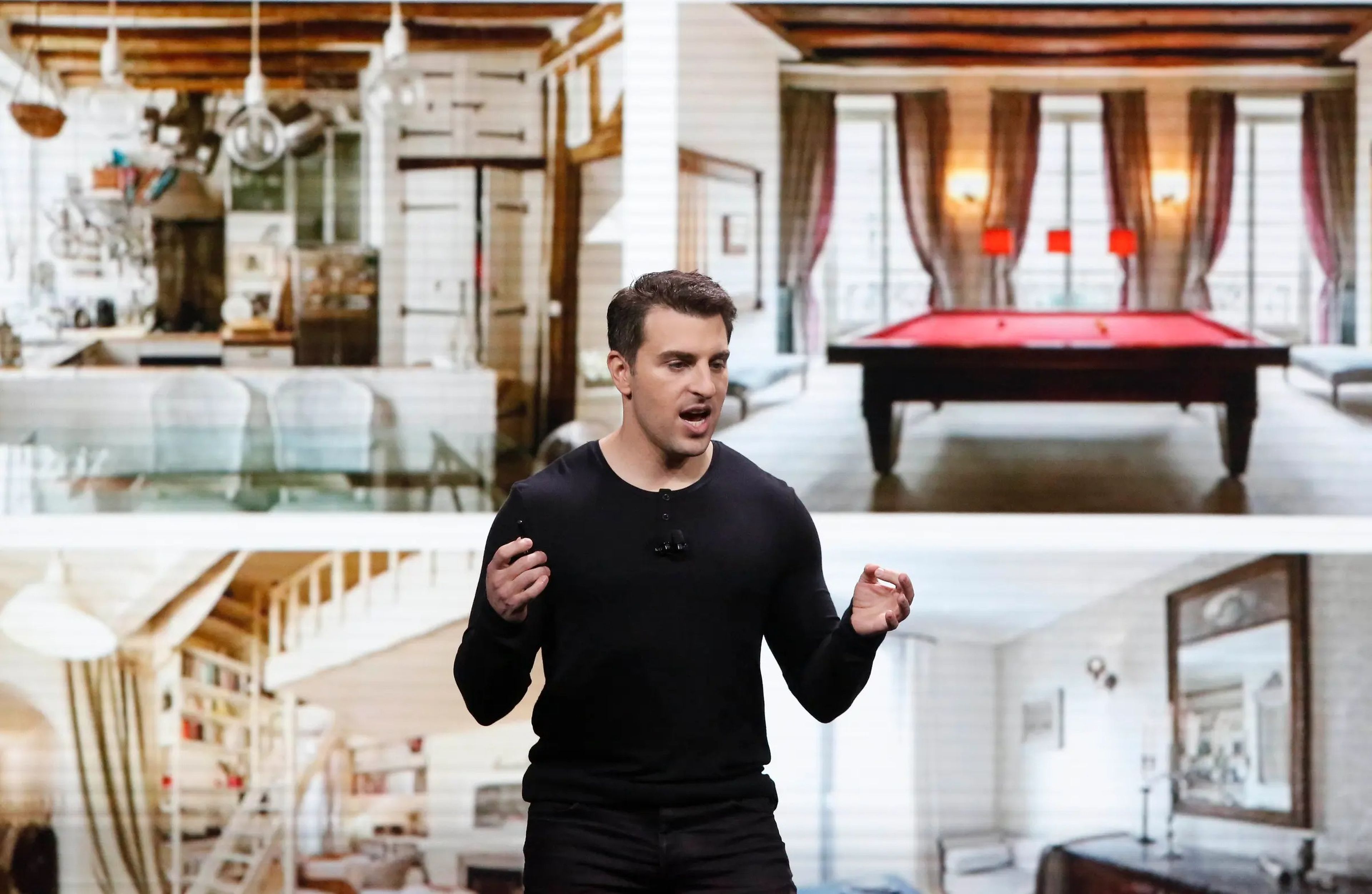 Brian Chesky speaking at a keynote in 2018