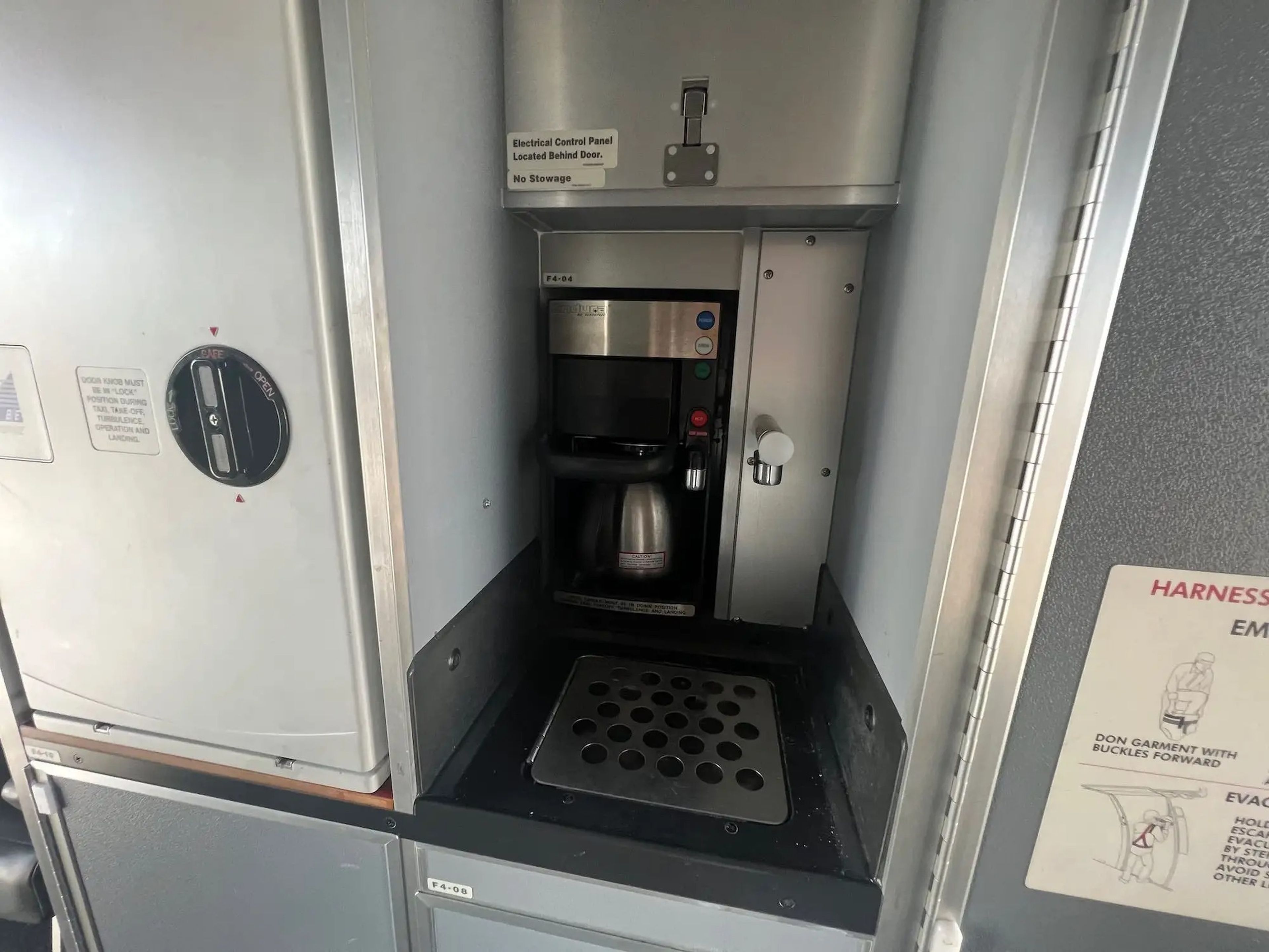 The coffee maker inside the galley area.