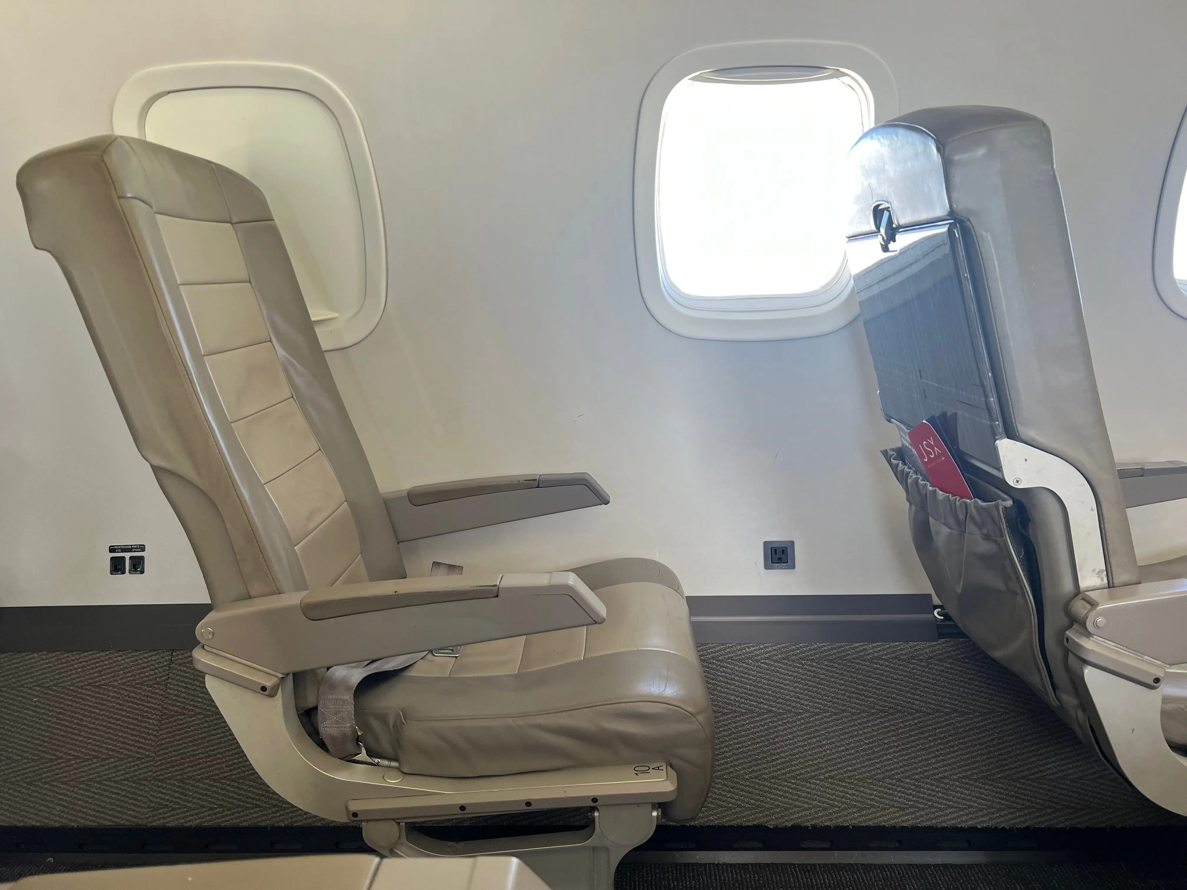 A side view of the beige seats onboard JSX's aircraft.