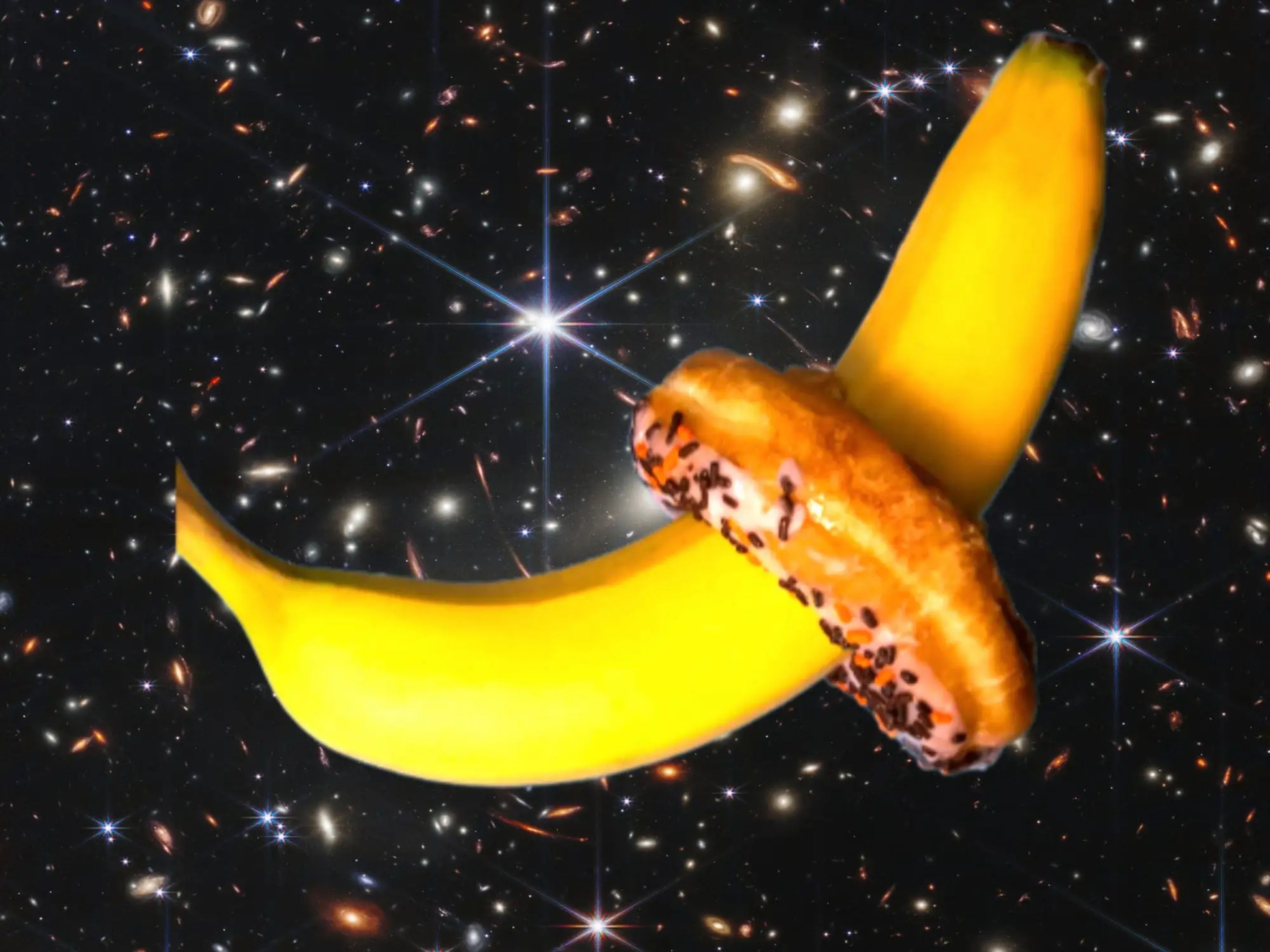banana stuck in donut hole against starry galaxy space background