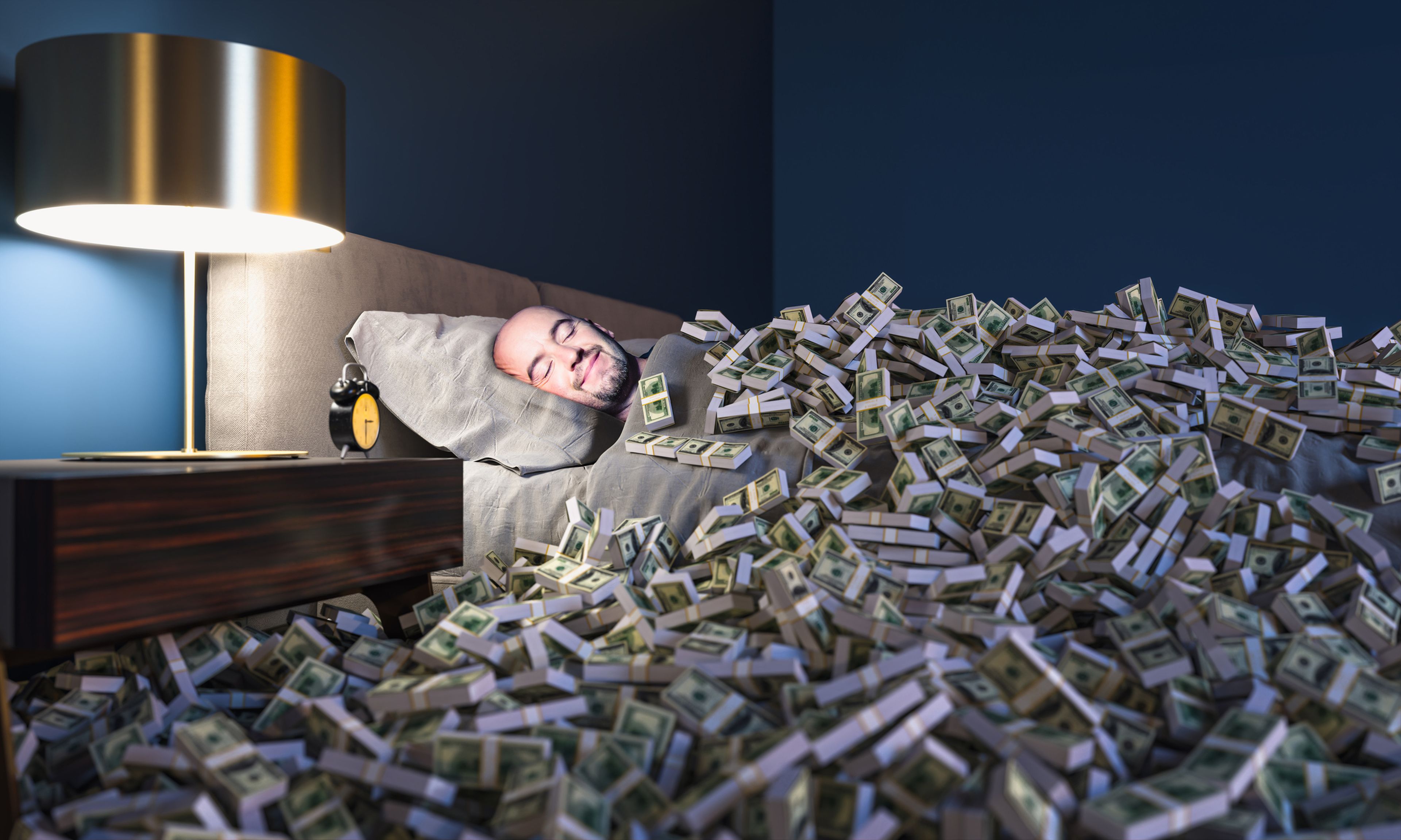 Un hombre duerme enterrado entre fajos de billetes.