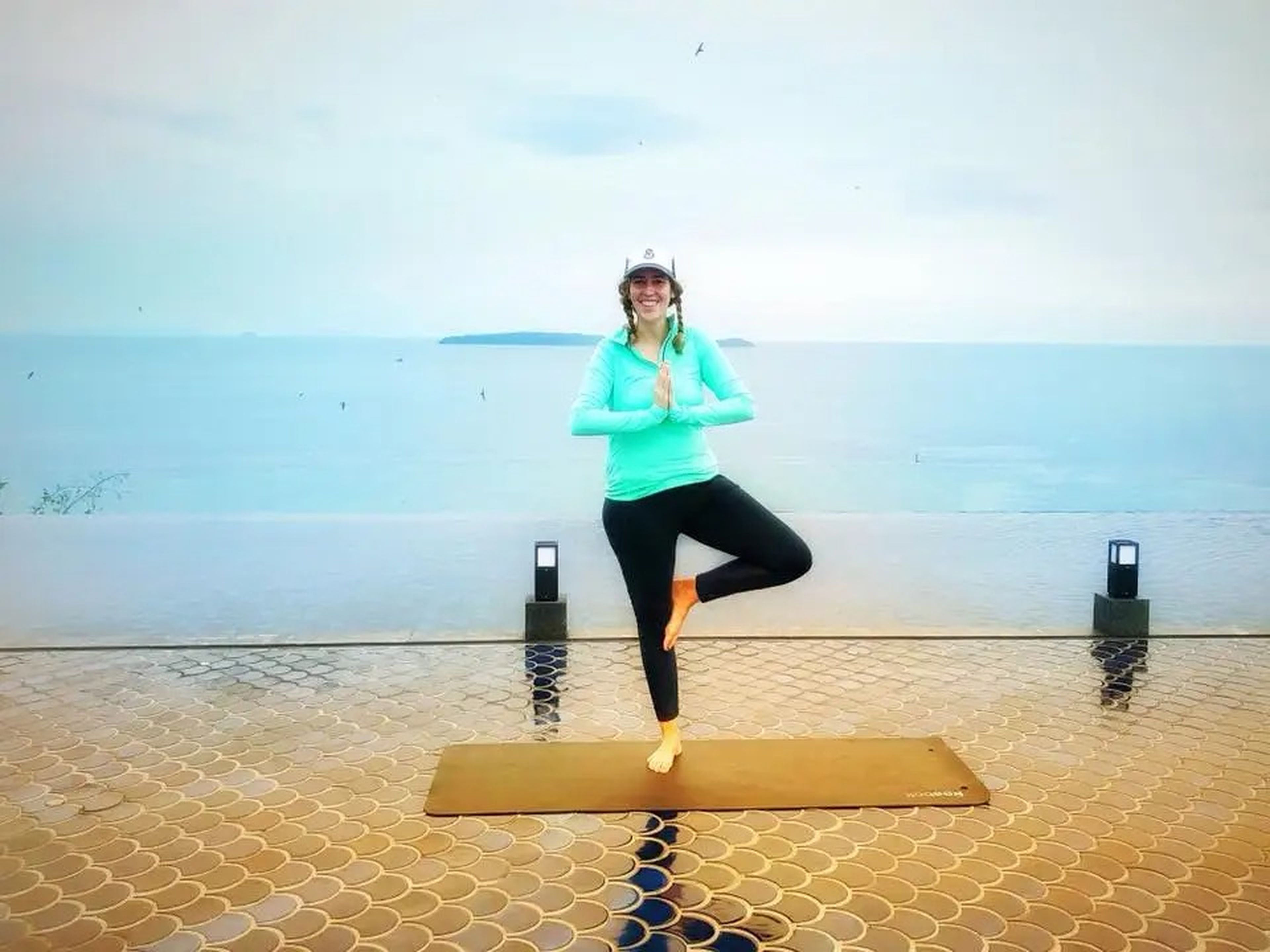 Michelle Gross practicing yoga on her solo trip to Phuket, Thailand.