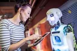 Una mujer interactuando con la inteligencia artificial.