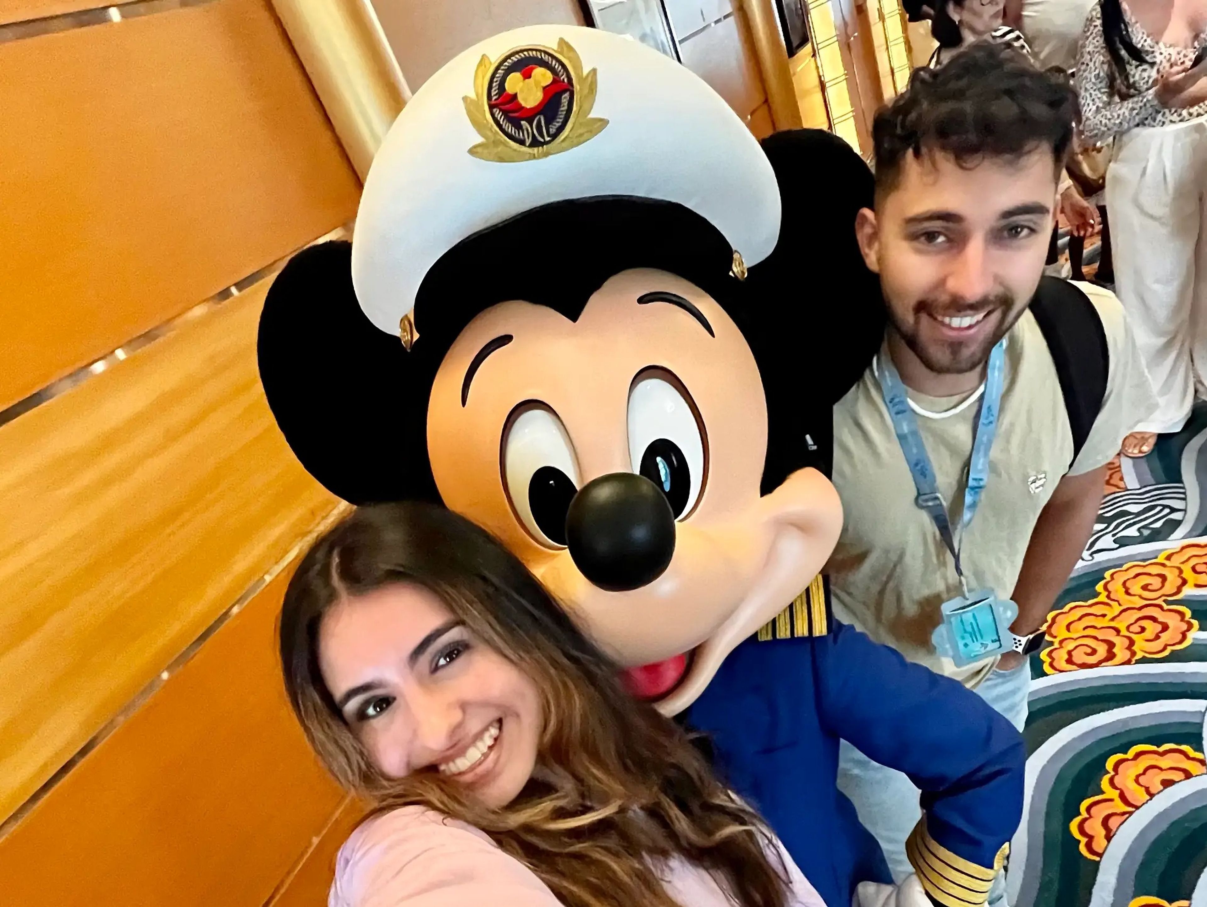 Nicole Cruz with Mickey Mouse when on the Disney Cruise.