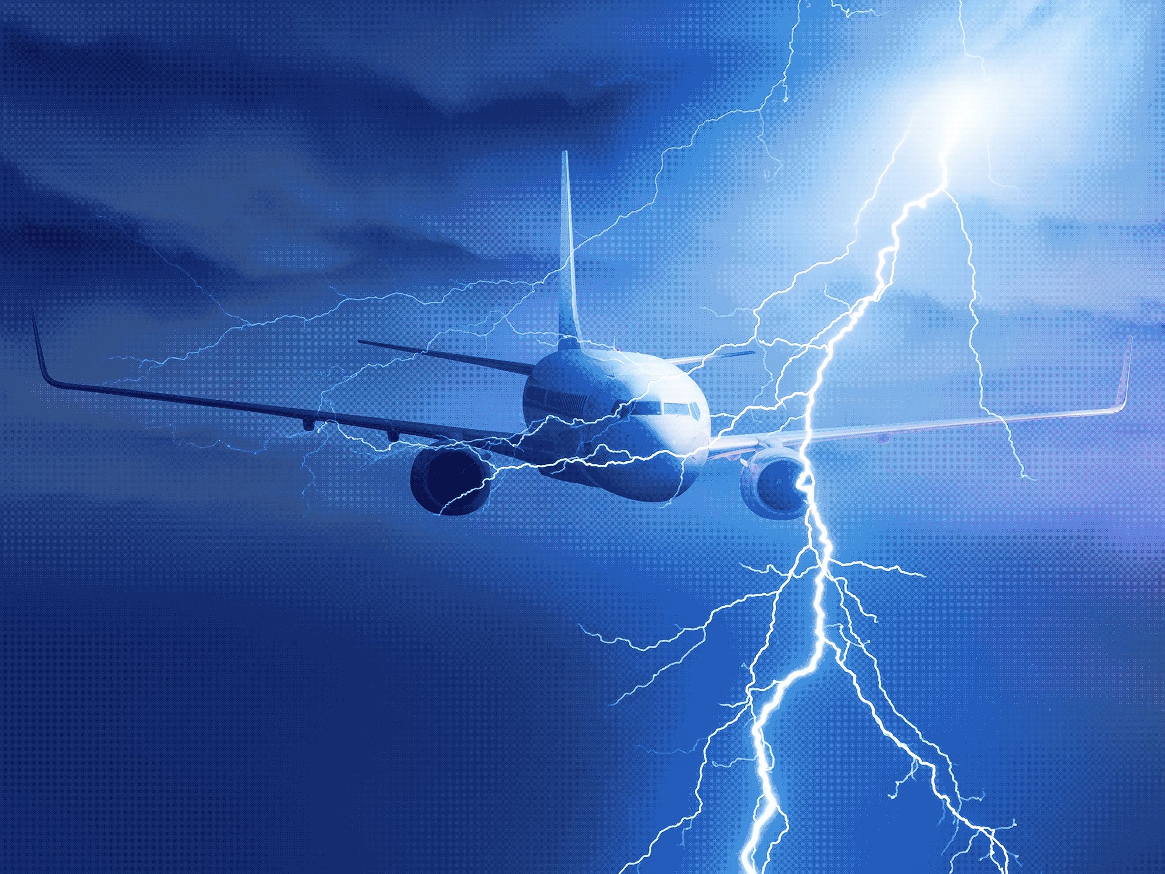 A plane flying through lightning